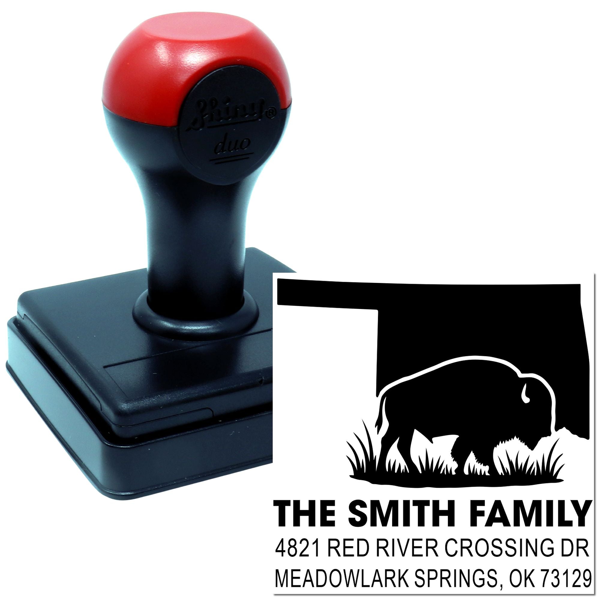 Custom self-inking rubber address stamp with bison design for return-address imprinting on envelopes.
