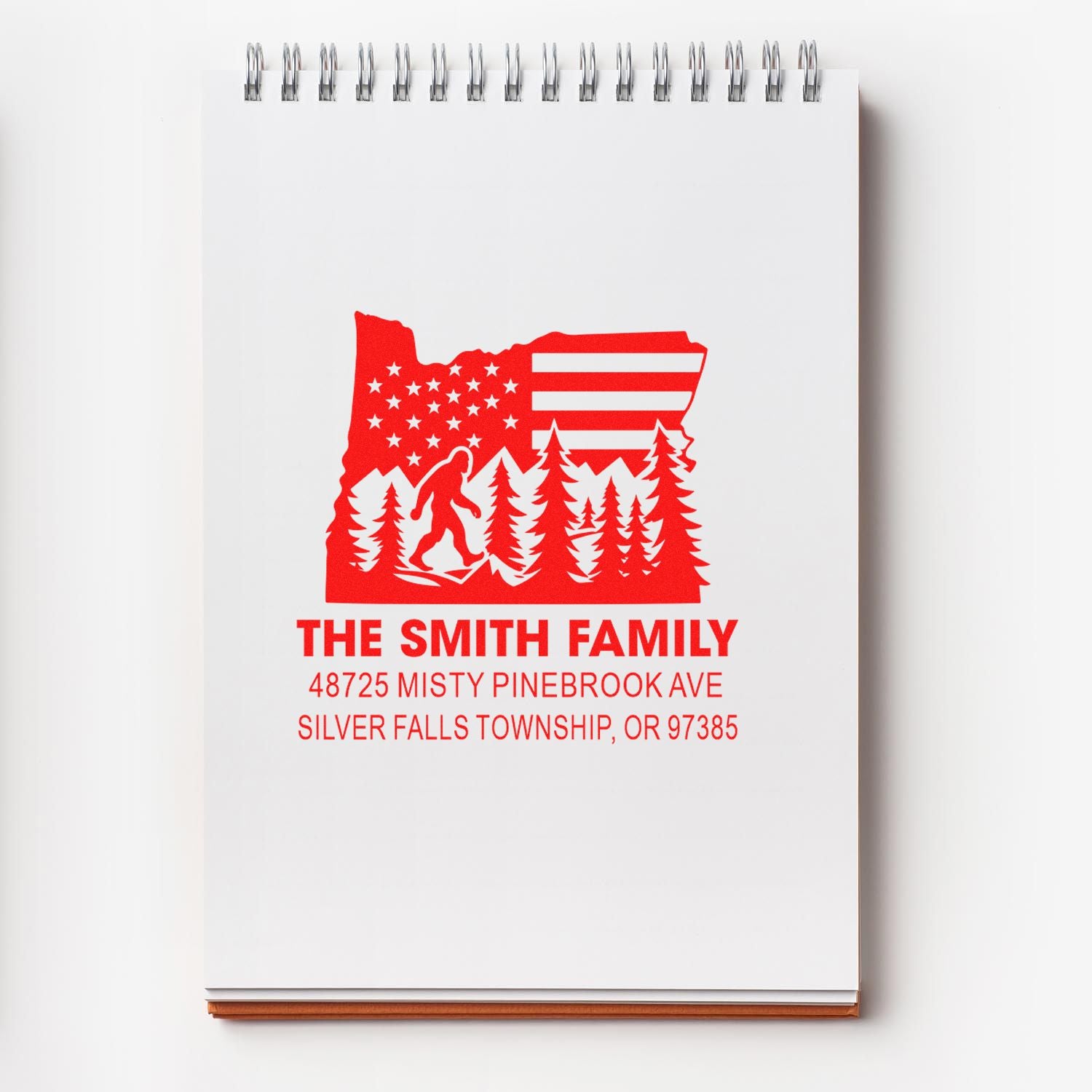 Custom address stamp for The Smith family featuring Oregon silhouette, trees, Bigfoot and American flag.