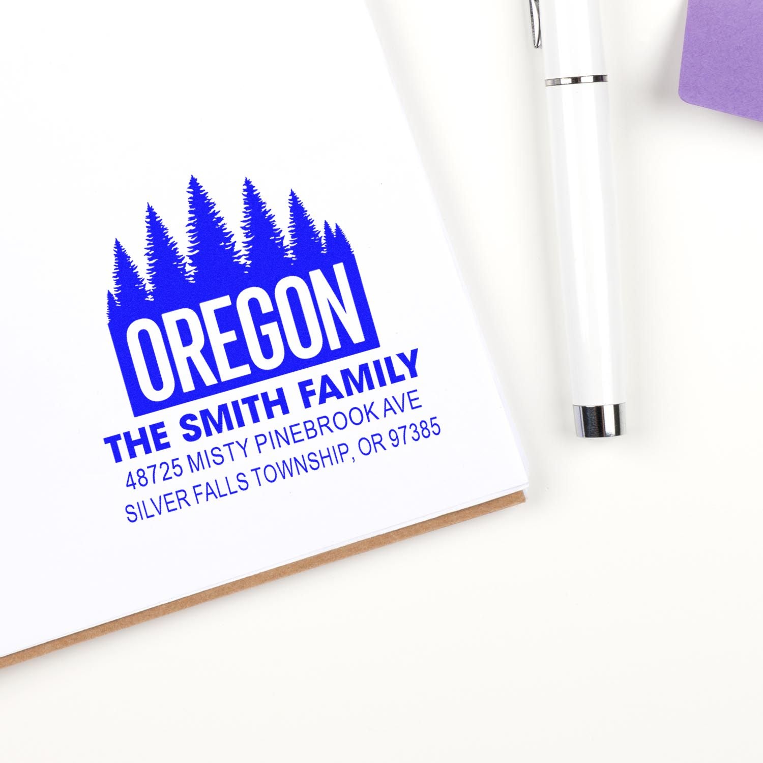 Custom Oregon return address rubber stamp for personalized stationery with family name and mailing address.