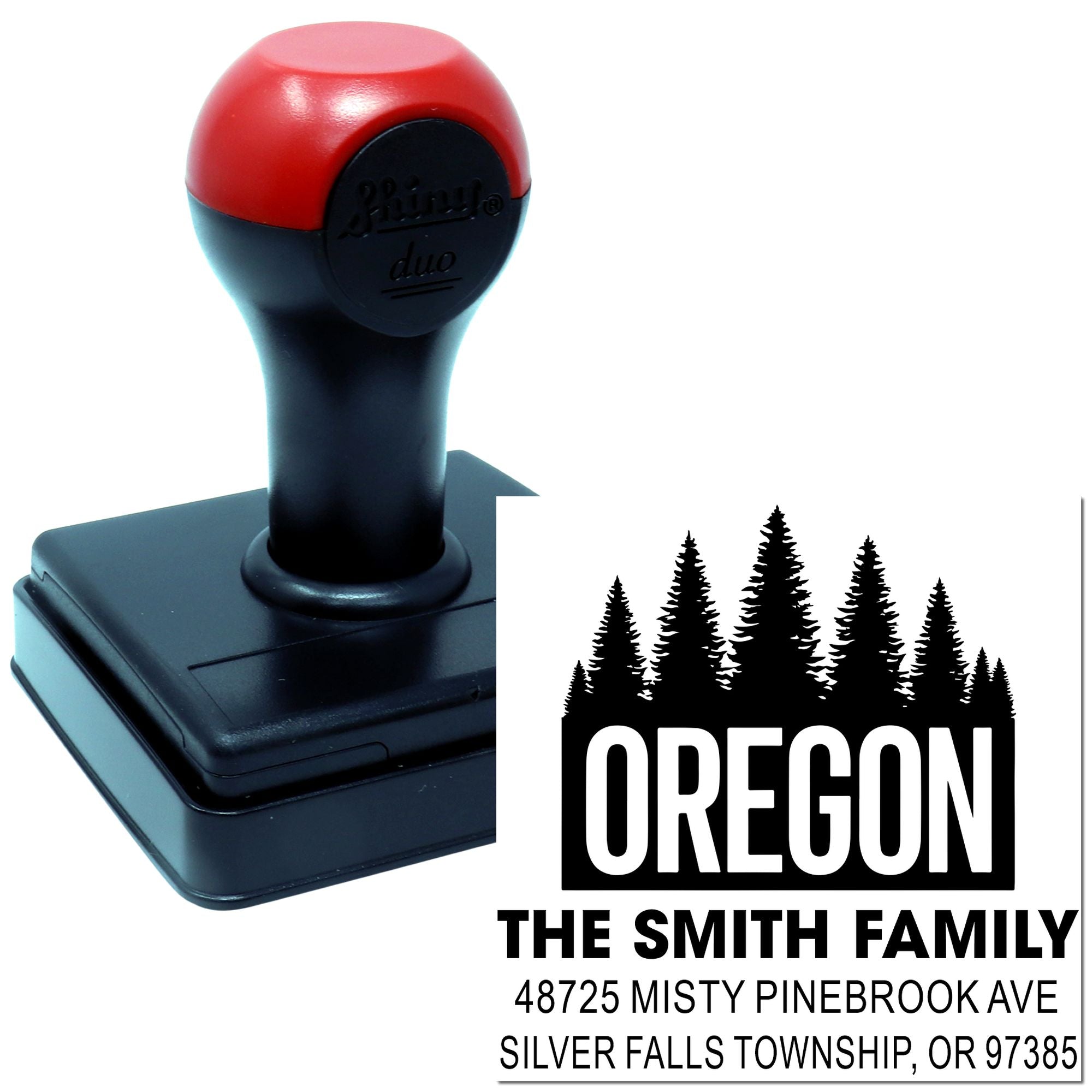 Custom self-inking address rubber stamp for The Smith Family, Oregon, with pine tree logo.