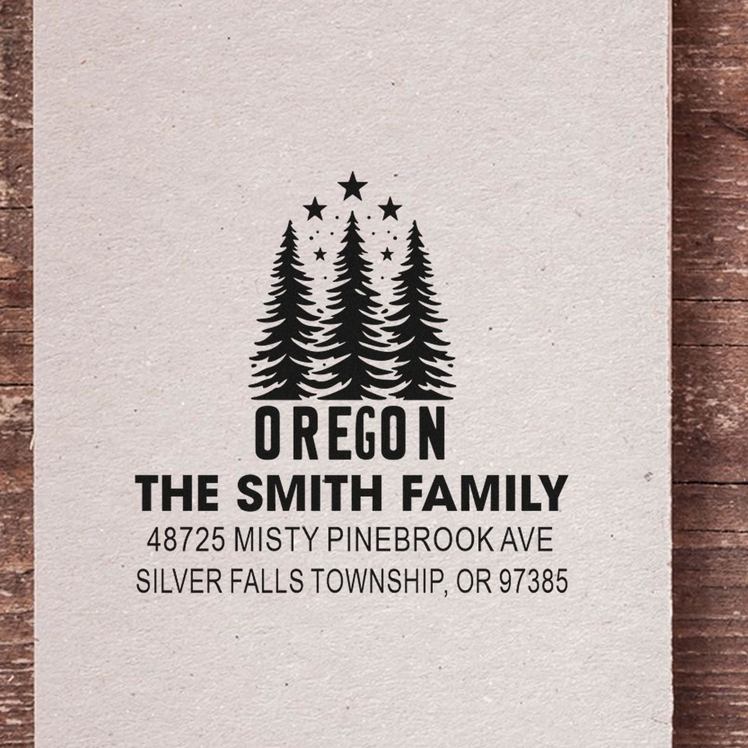 Custom Oregon return address rubber stamp with pine trees for The Smith Family, Silver Falls Township, OR 97385