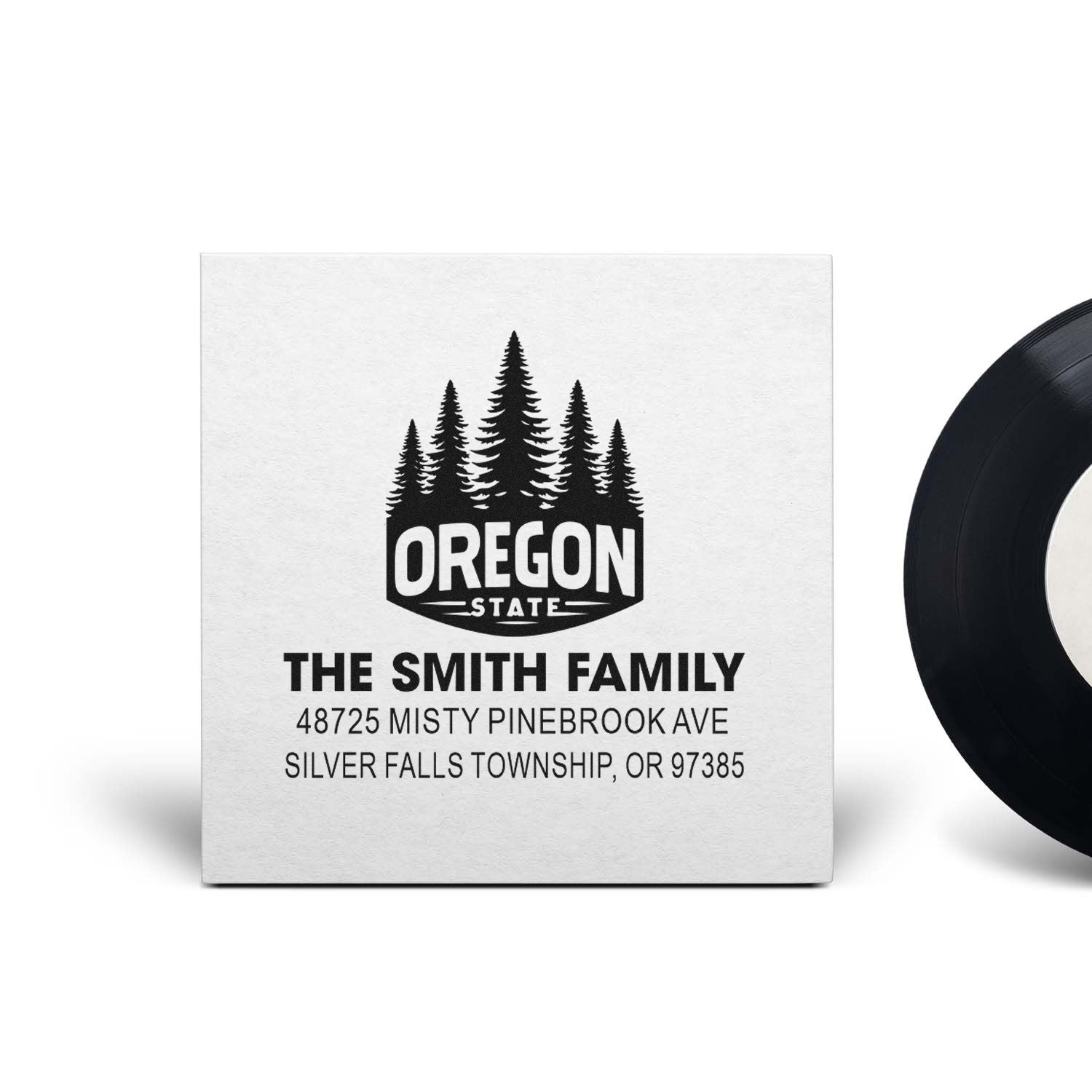Custom Oregon family address rubber stamp with pine tree logo for The Smith Family, featuring name and mailing address.