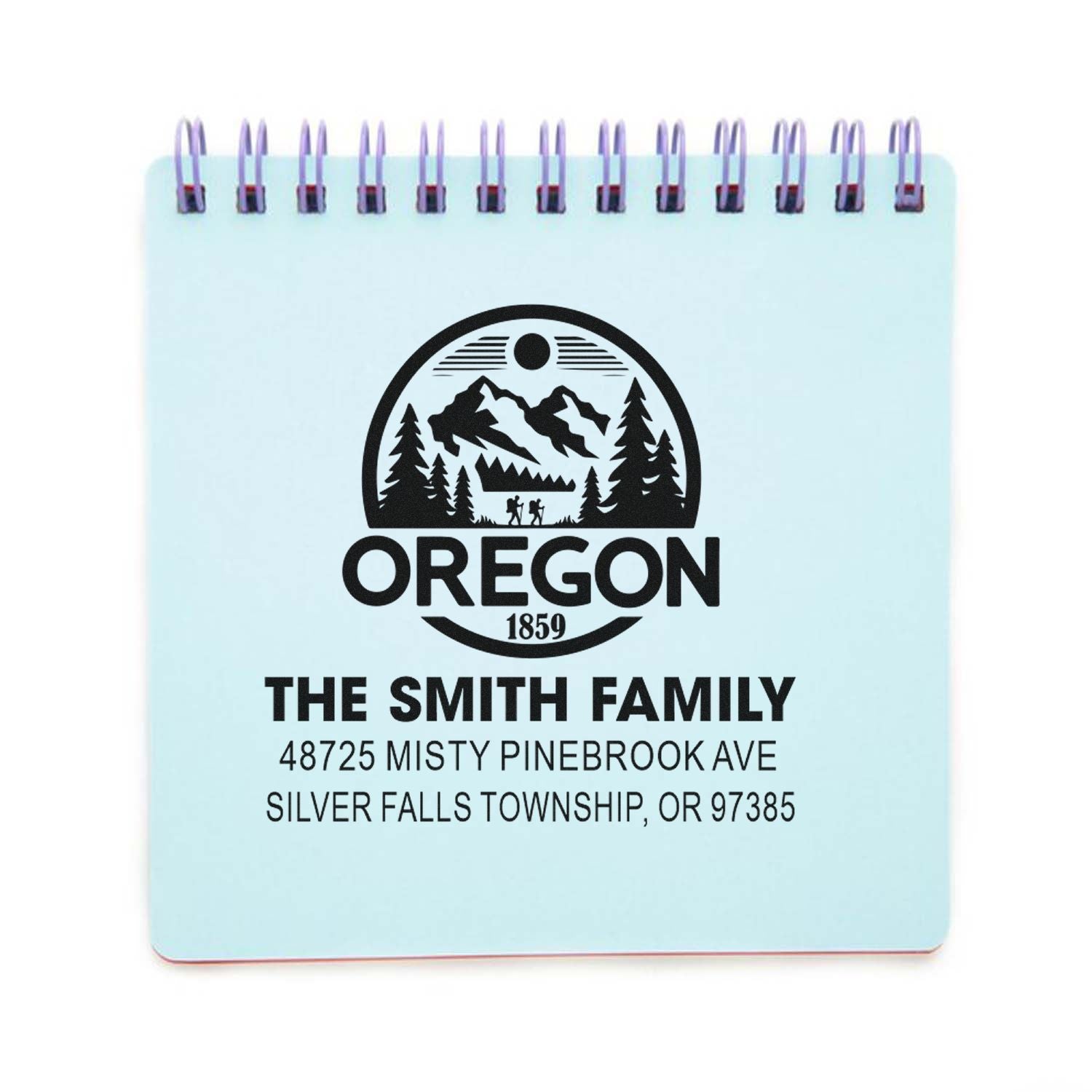 Custom Oregon address rubber stamp with family name, mountain logo, and Silver Falls Township return address.