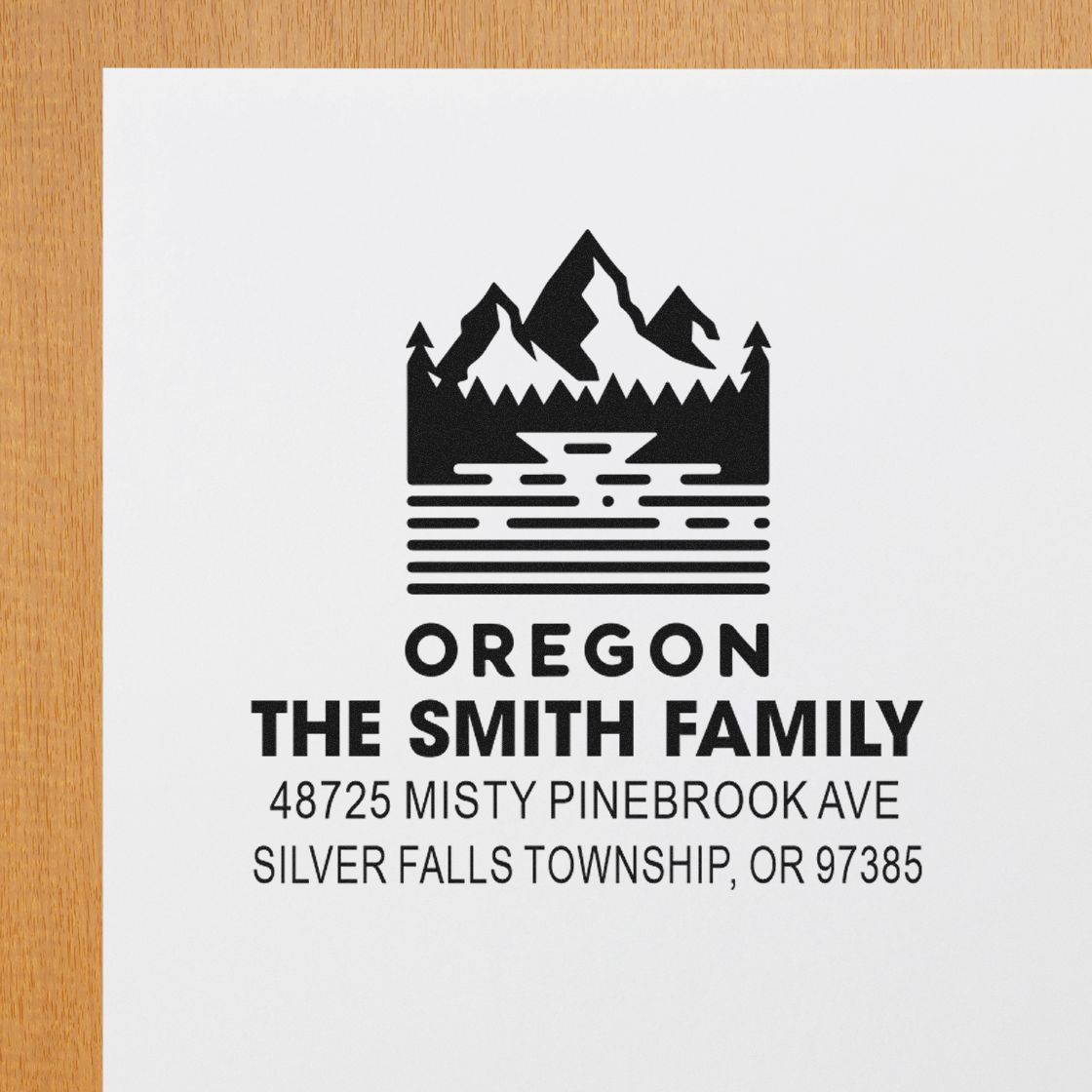 Custom Oregon rubber stamp with mountain logo, The Smith Family address, Silver Falls Township, OR 97385.