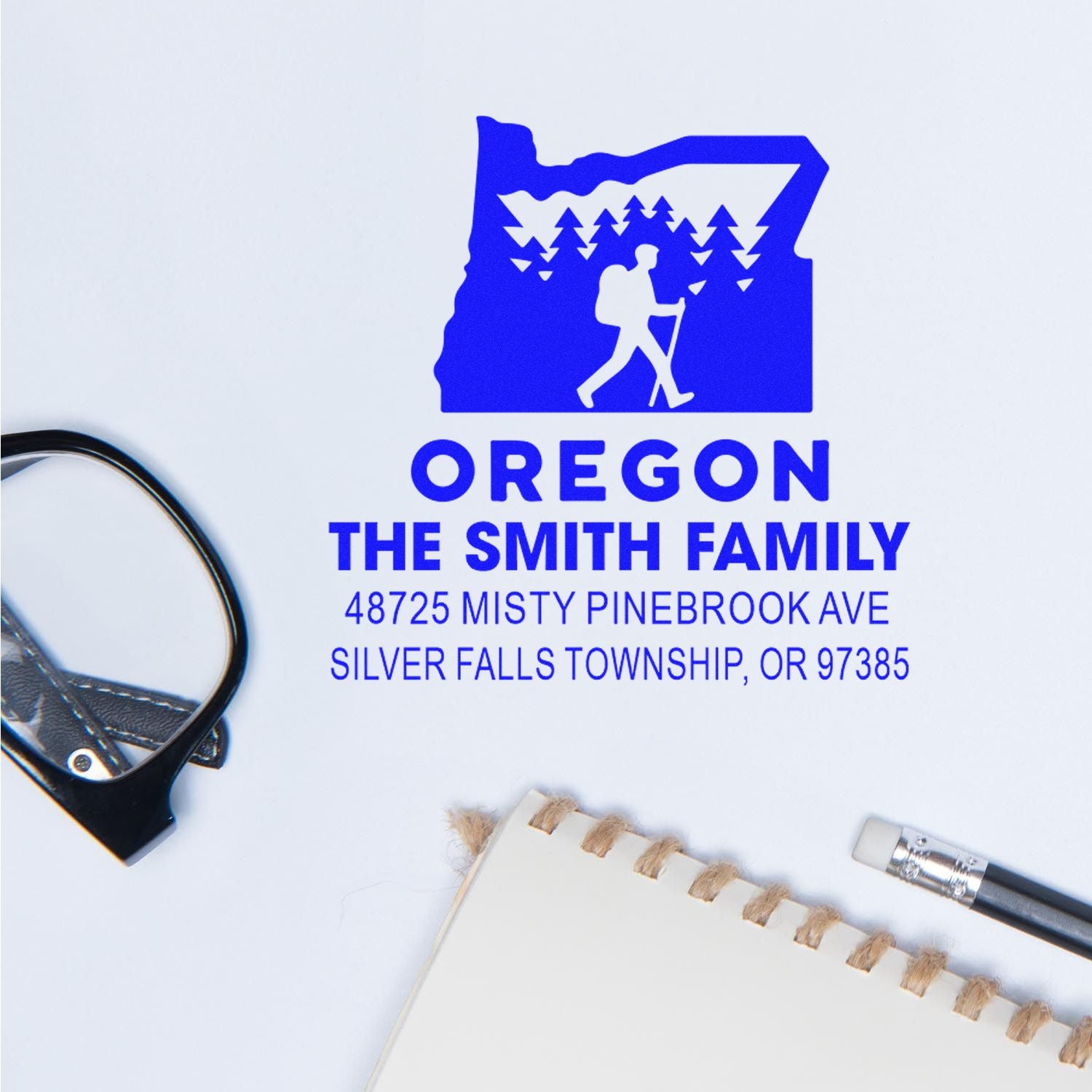 Custom address rubber stamp for The Smith Family in Oregon, featuring a hiking logo and Silver Falls Township return address.