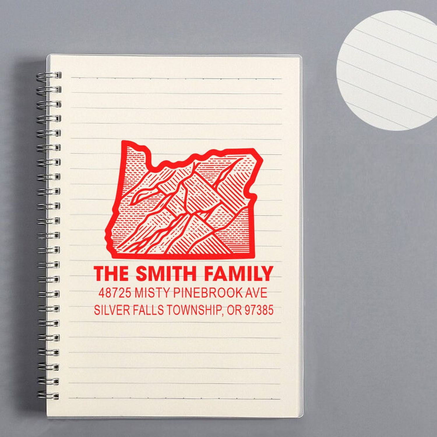 Custom rubber stamp return address design with Oregon state graphic, The Smith Family name, and mailing address.
