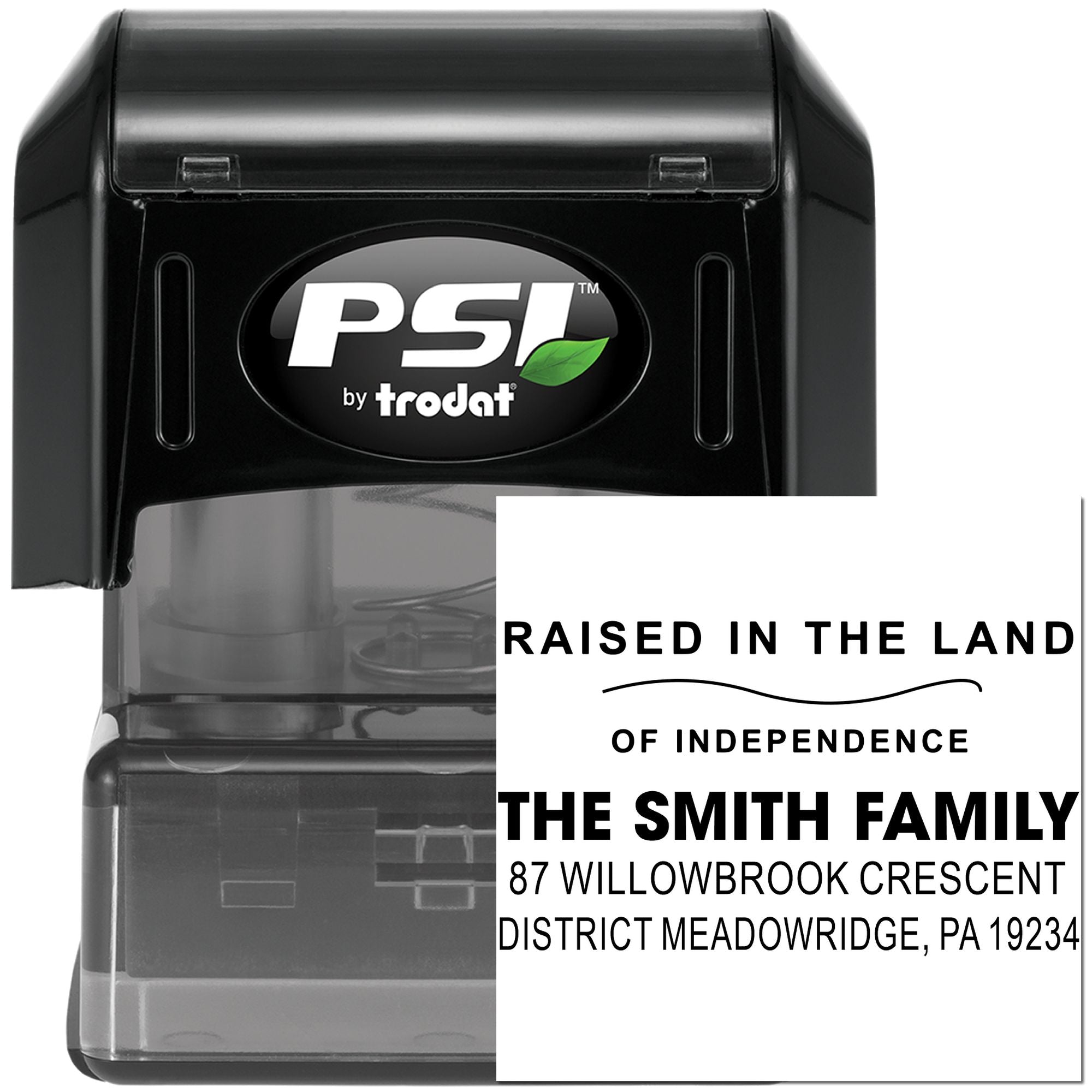 Custom self-inking rubber stamp by PSI Trodat, showing a personalized family address imprint for return mail.