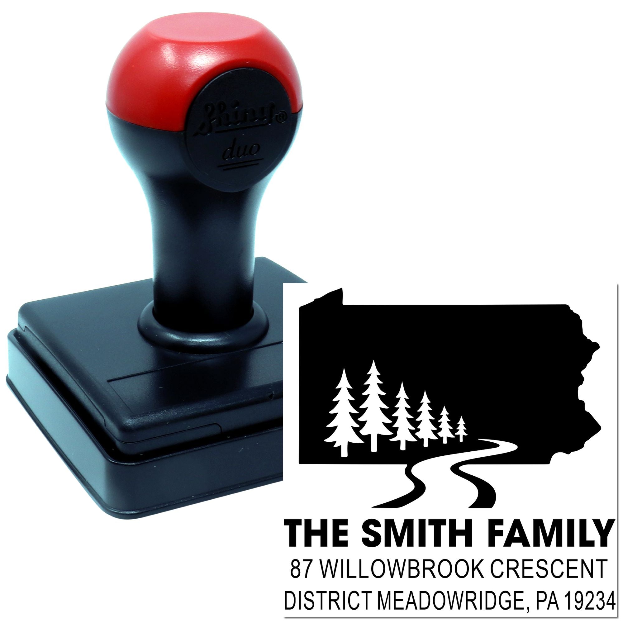 Custom self-inking rubber address stamp with family name and Pennsylvania tree design for personalized mailings.