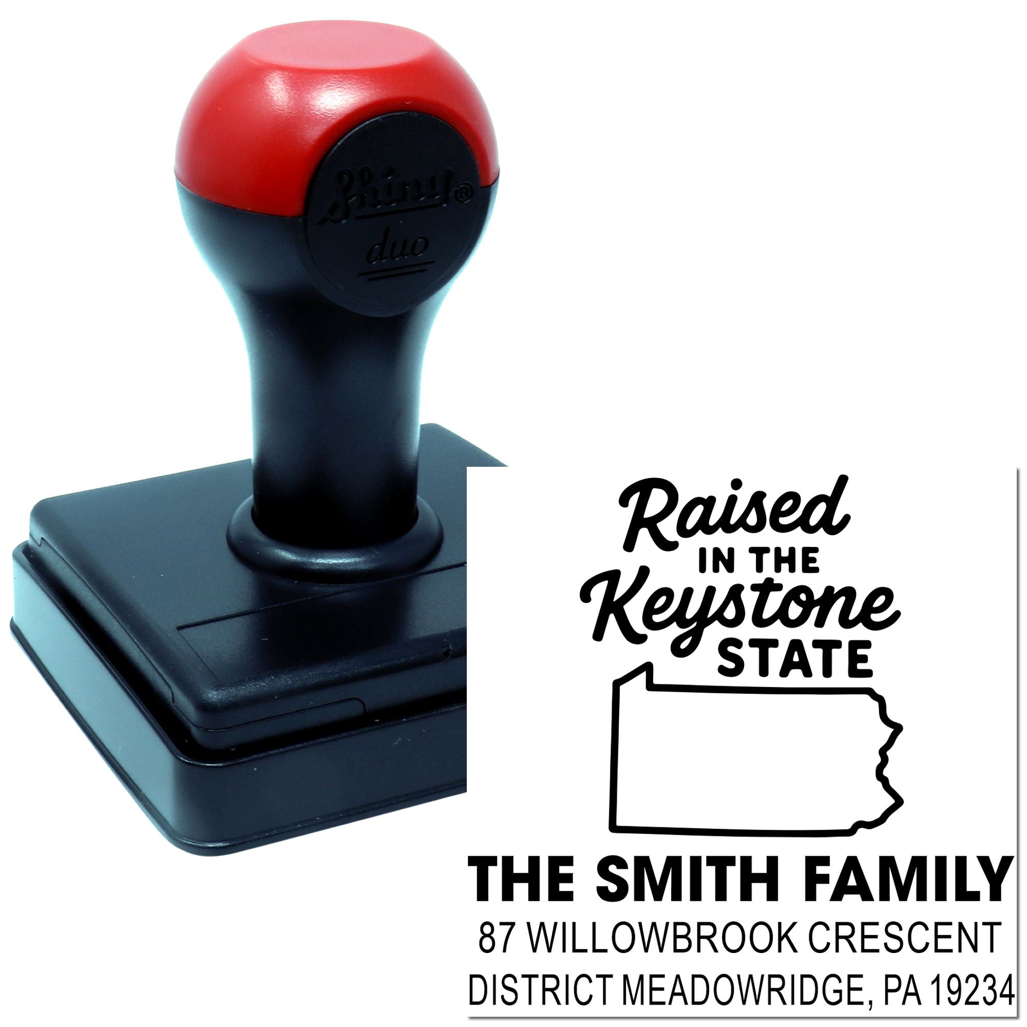 Custom self-inking rubber stamp for a Pennsylvania family address, featuring Raised in the Keystone State design.