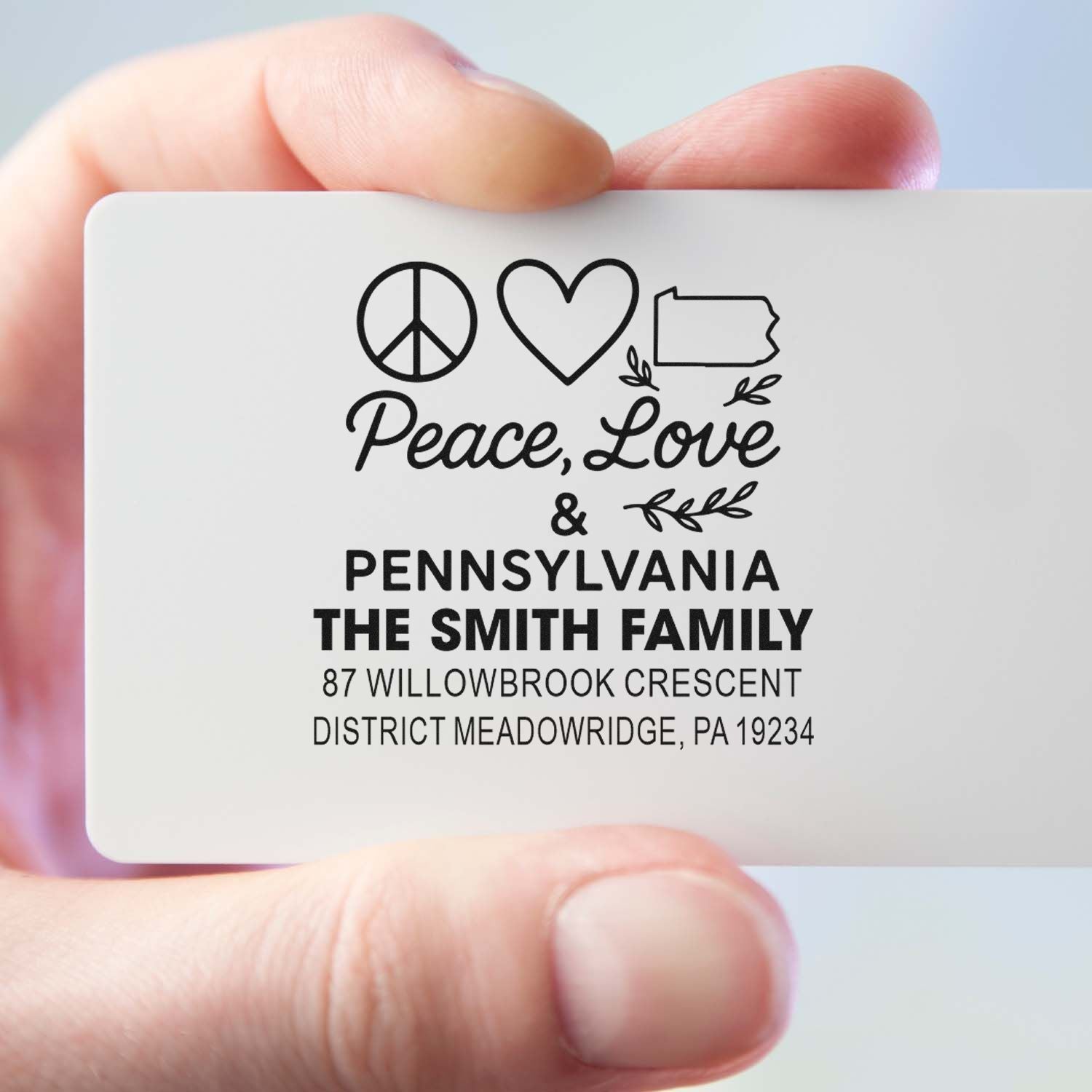 Custom rubber return address stamp with Peace, Love & Pennsylvania design for The Smith Family.
