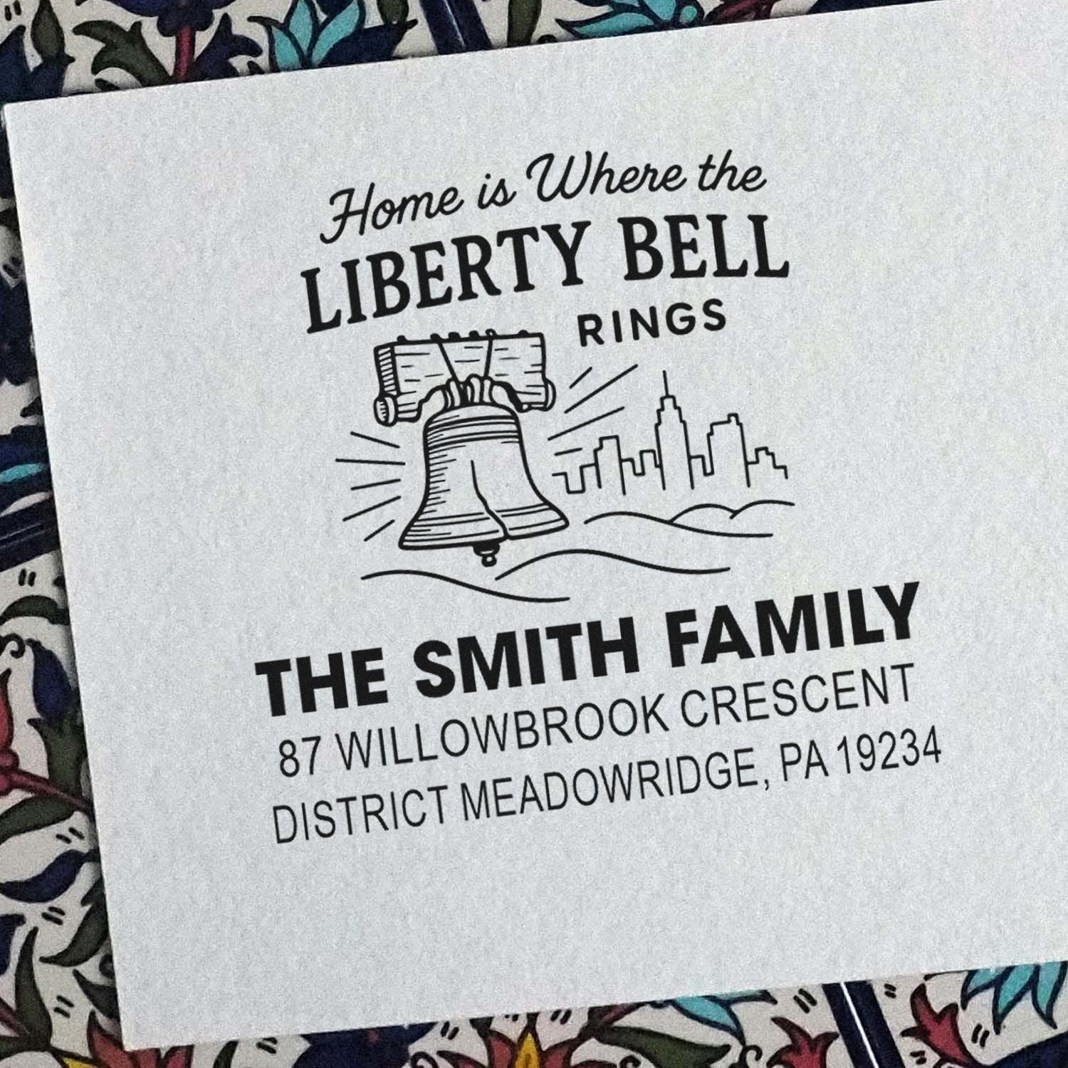 Custom family address rubber stamp with Liberty Bell design and Smith family return address for Philadelphia mailings.