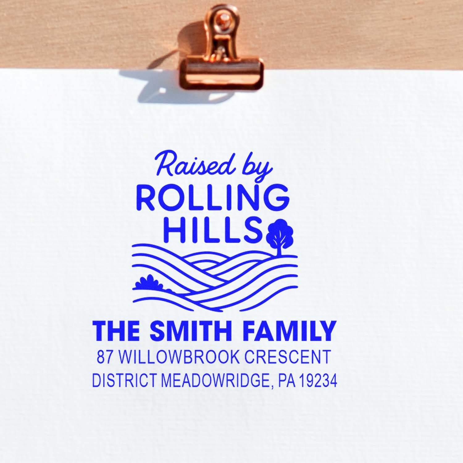 Custom rubber stamp for The Smith Family return address, featuring Raised by Rolling Hills logo and Meadowridge PA address.