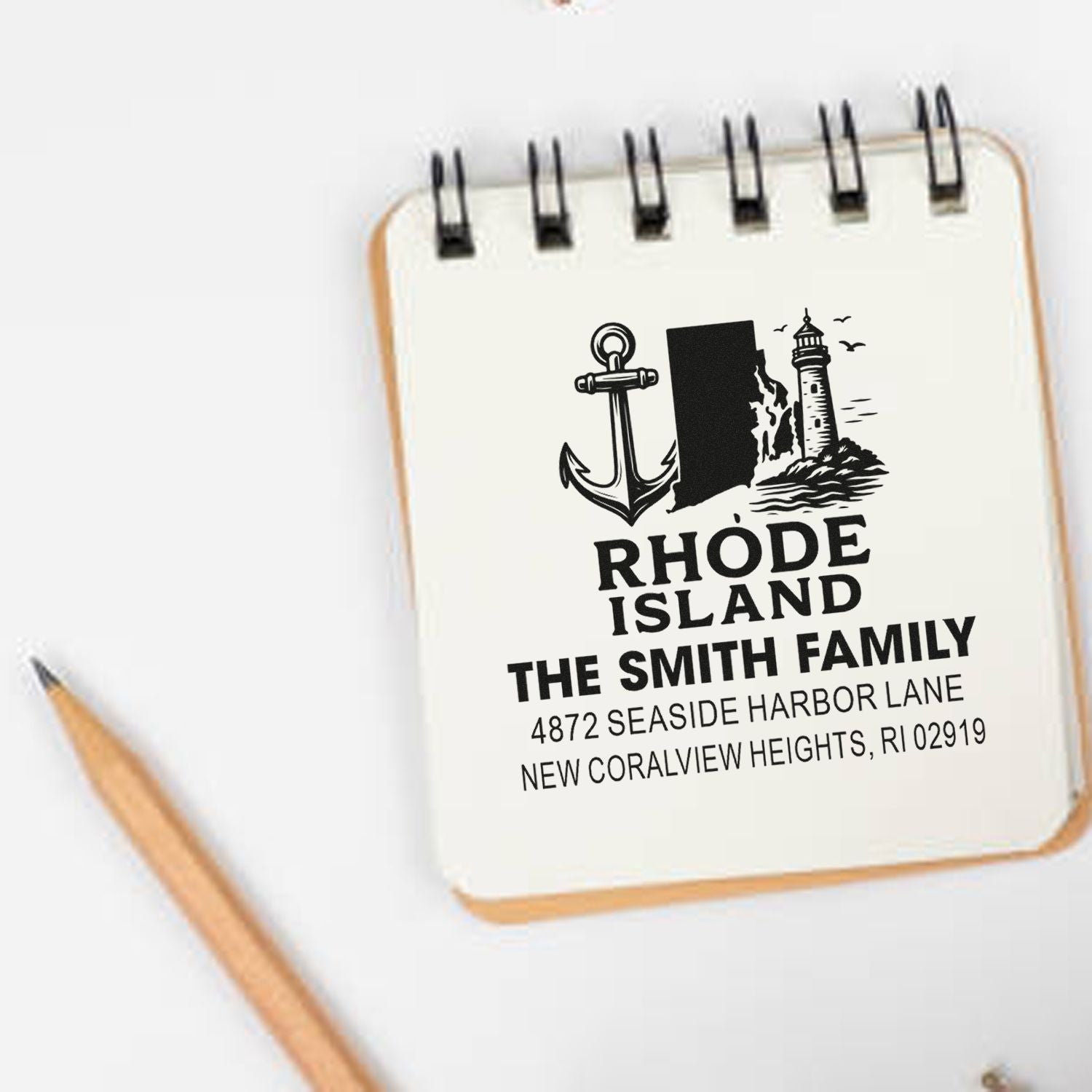 Custom Rhode Island family address rubber stamp with anchor and lighthouse design for personalized stationery.