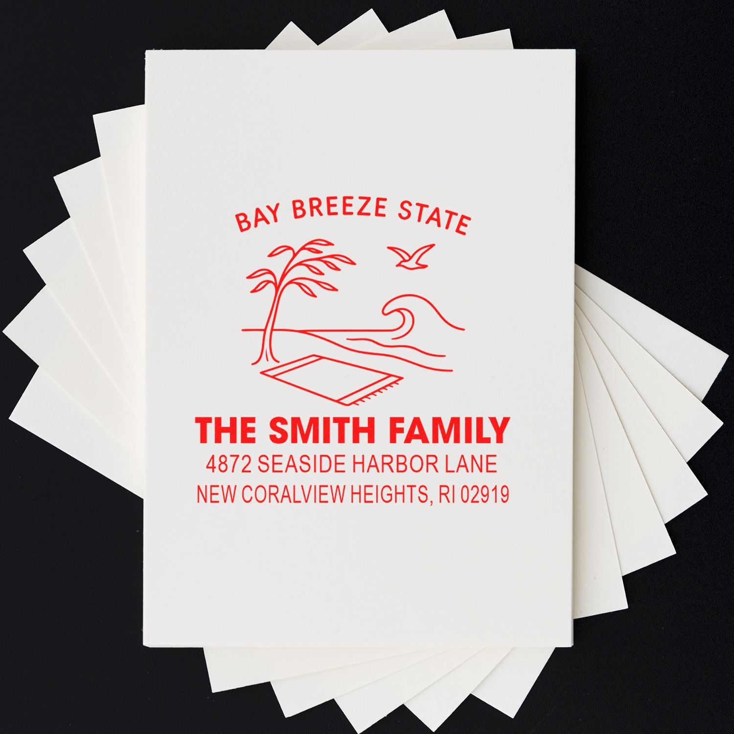 Custom beach-themed return address rubber stamp for The Smith Family, featuring seaside art and Rhode Island address.