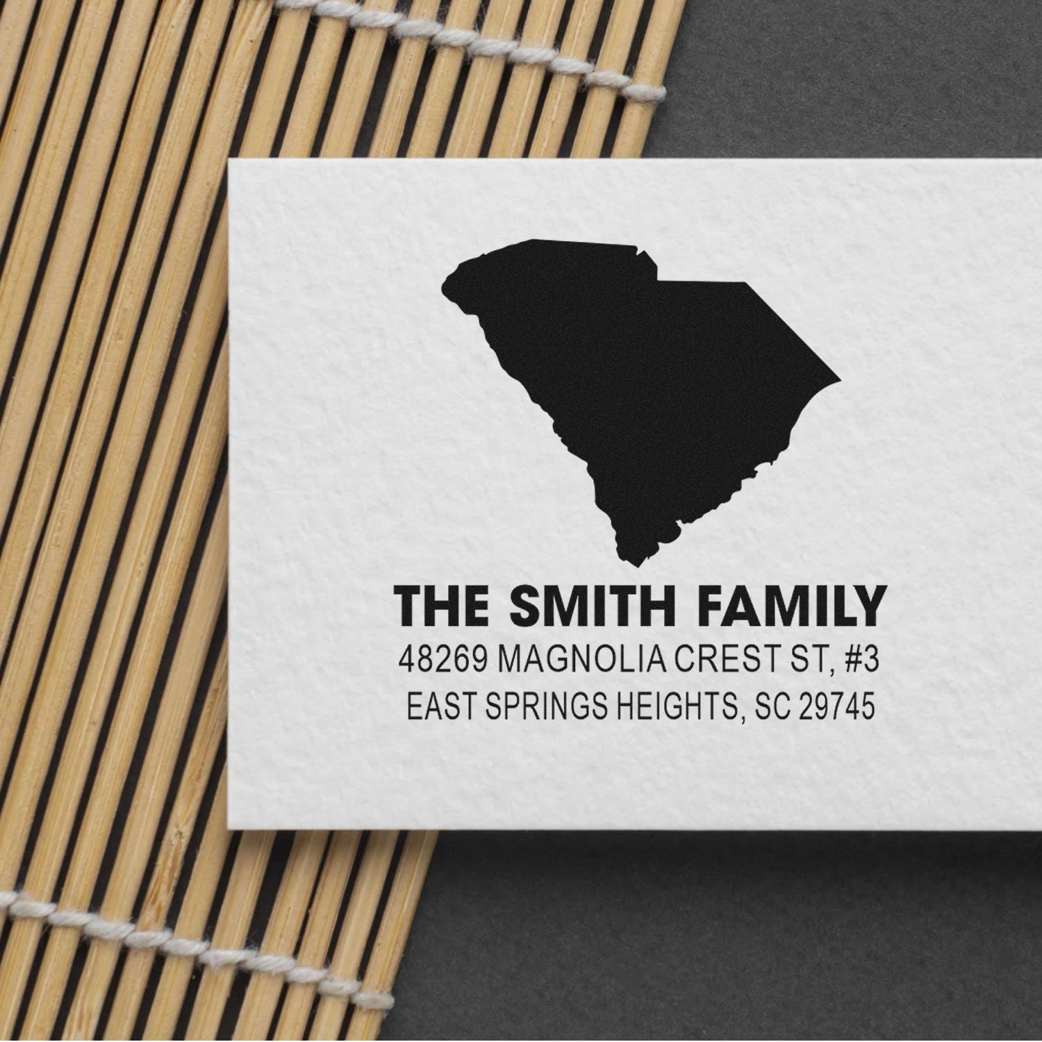 Custom South Carolina return address rubber stamp for The Smith Family with name and mailing address on white card.