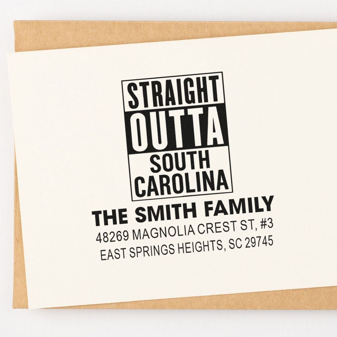 Custom rubber stamp impression reading Straight Outta South Carolina with The Smith Family return address.