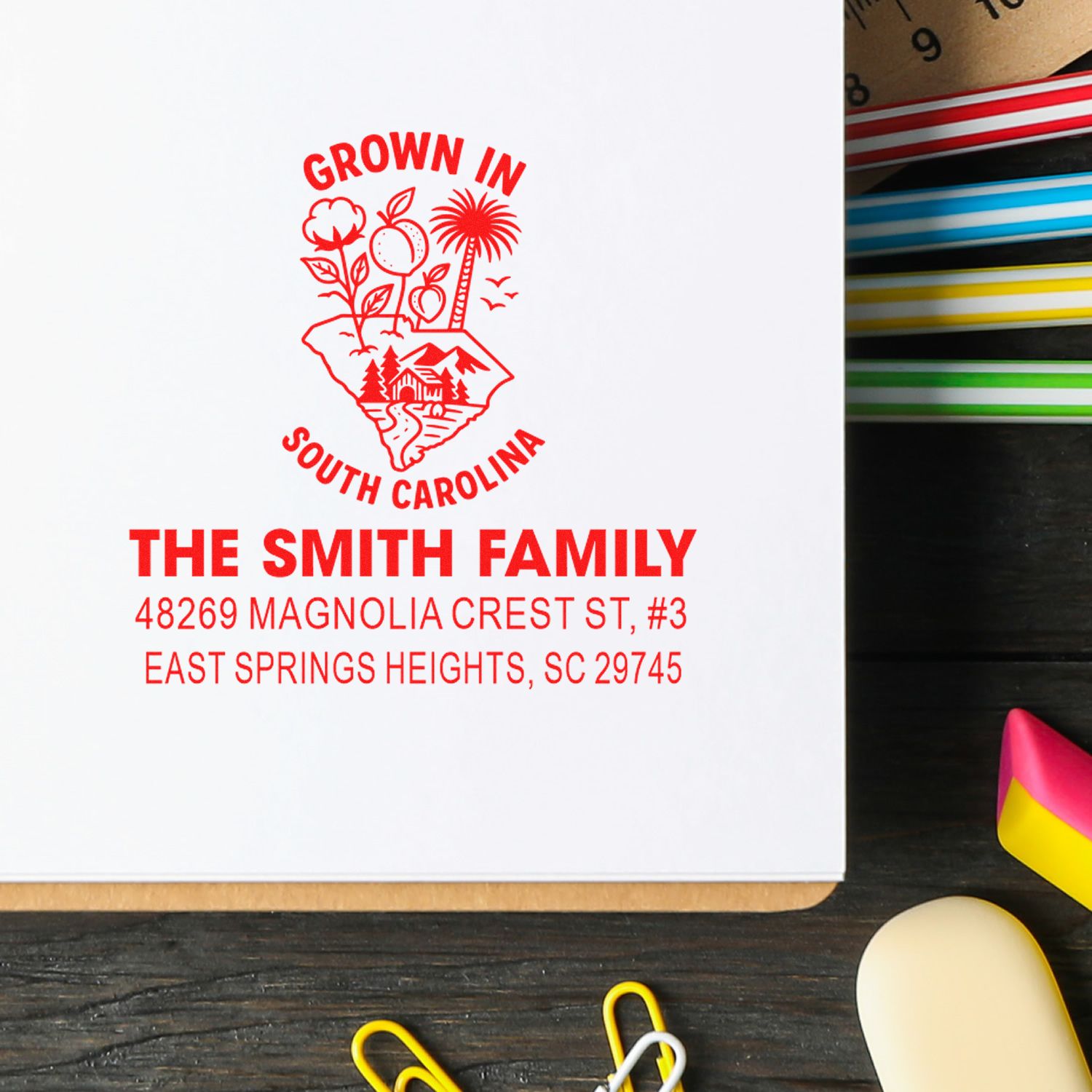 Personalized return address rubber stamp with South Carolina family logo, Smith family name, and custom address.