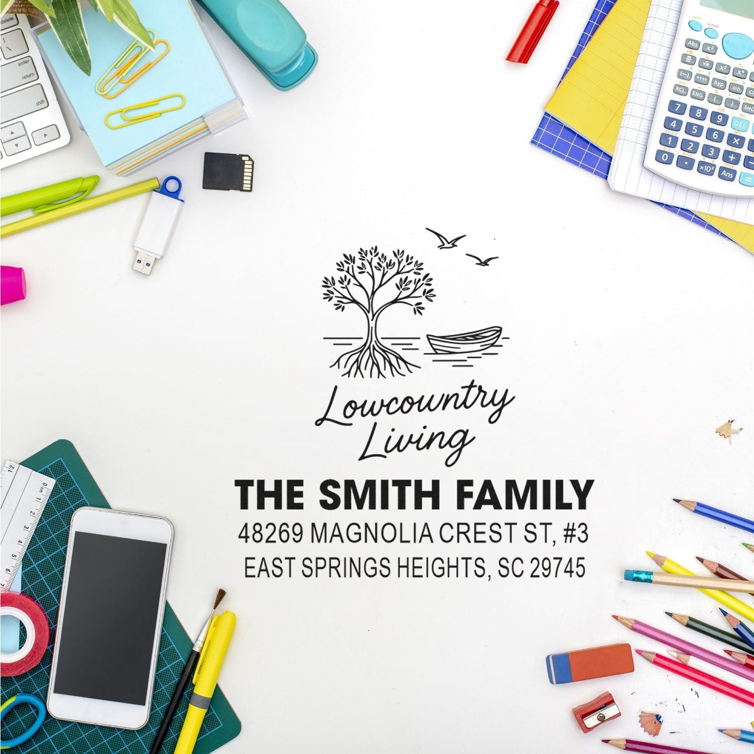 Custom return address rubber stamp with Lowcountry Living design, The Smith Family name, and address on a craft desk.