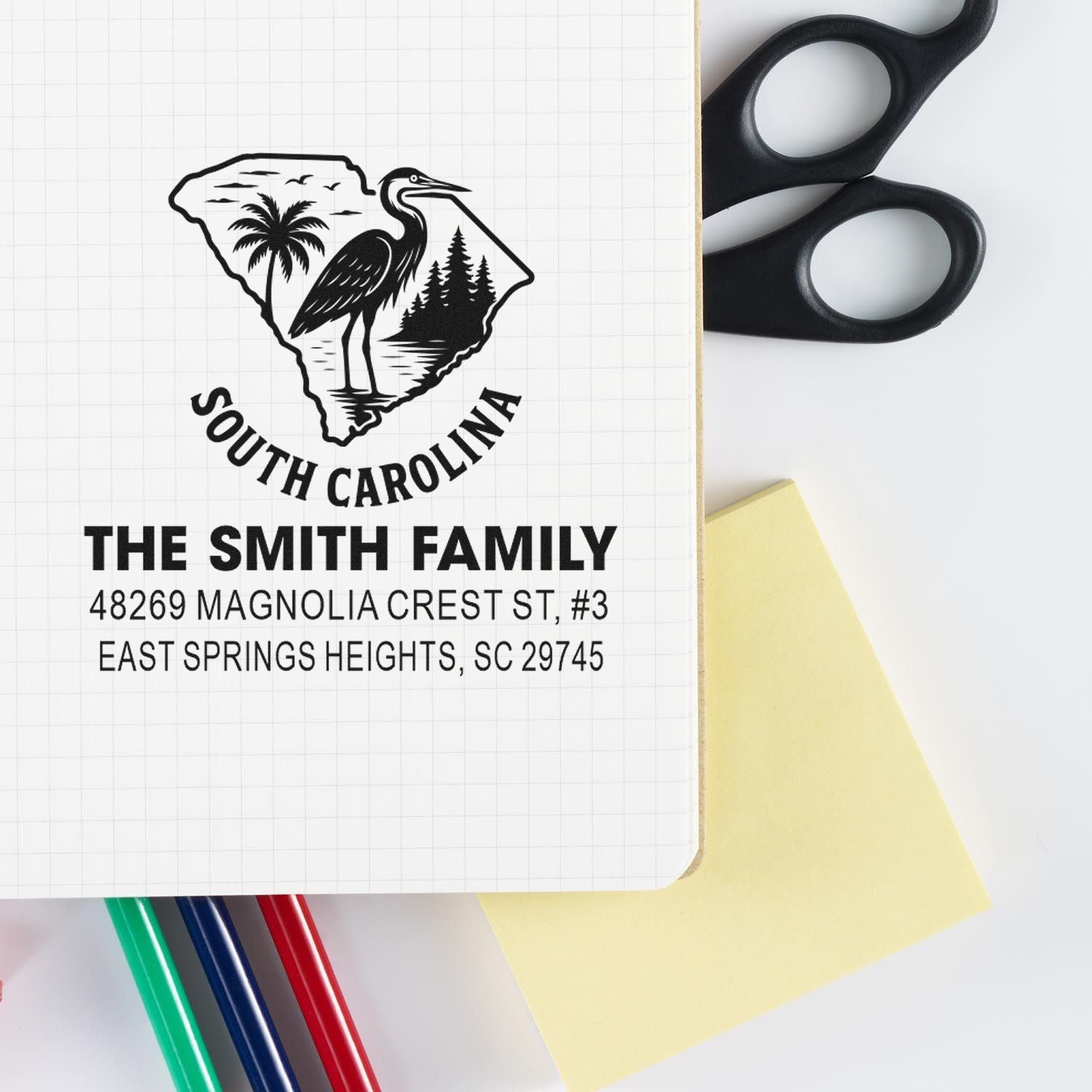 Personalized South Carolina address rubber stamp with family name, street address, and state design for envelopes.