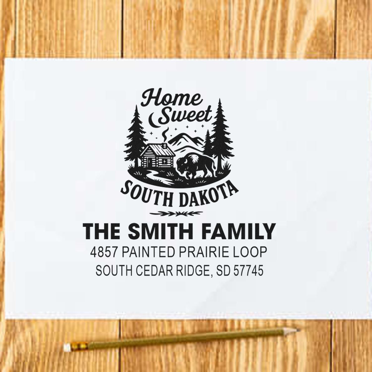 Personalized return address rubber stamp with Home Sweet South Dakota cabin and bison design for The Smith Family.