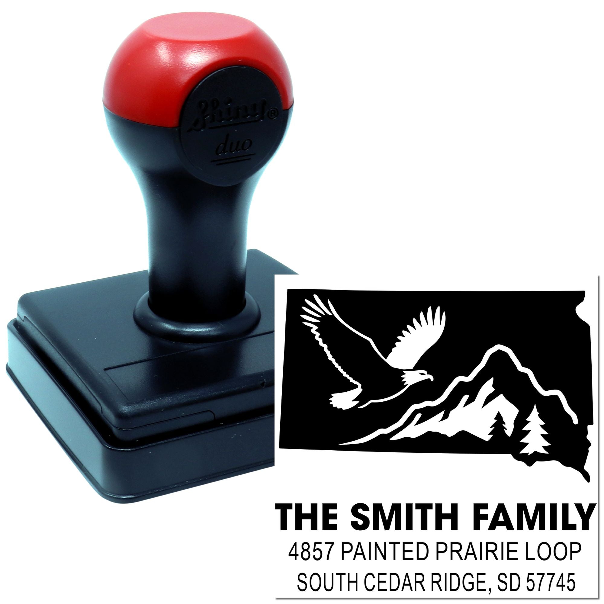 Custom return address rubber stamp for The Smith Family with eagle and mountain logo.