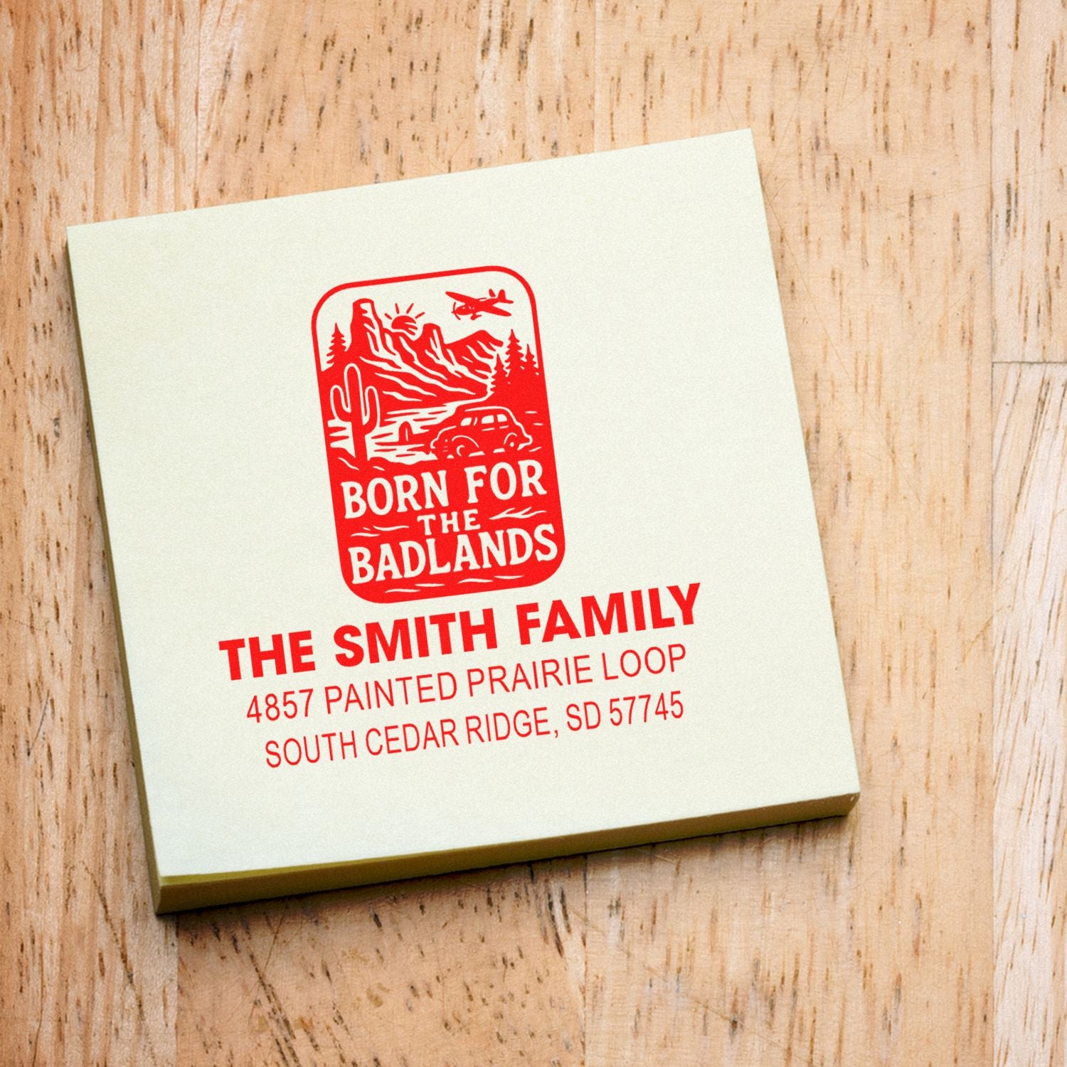 Custom rubber stamp with Born for the Badlands design and family address for personalized mail, cards, and crafts.