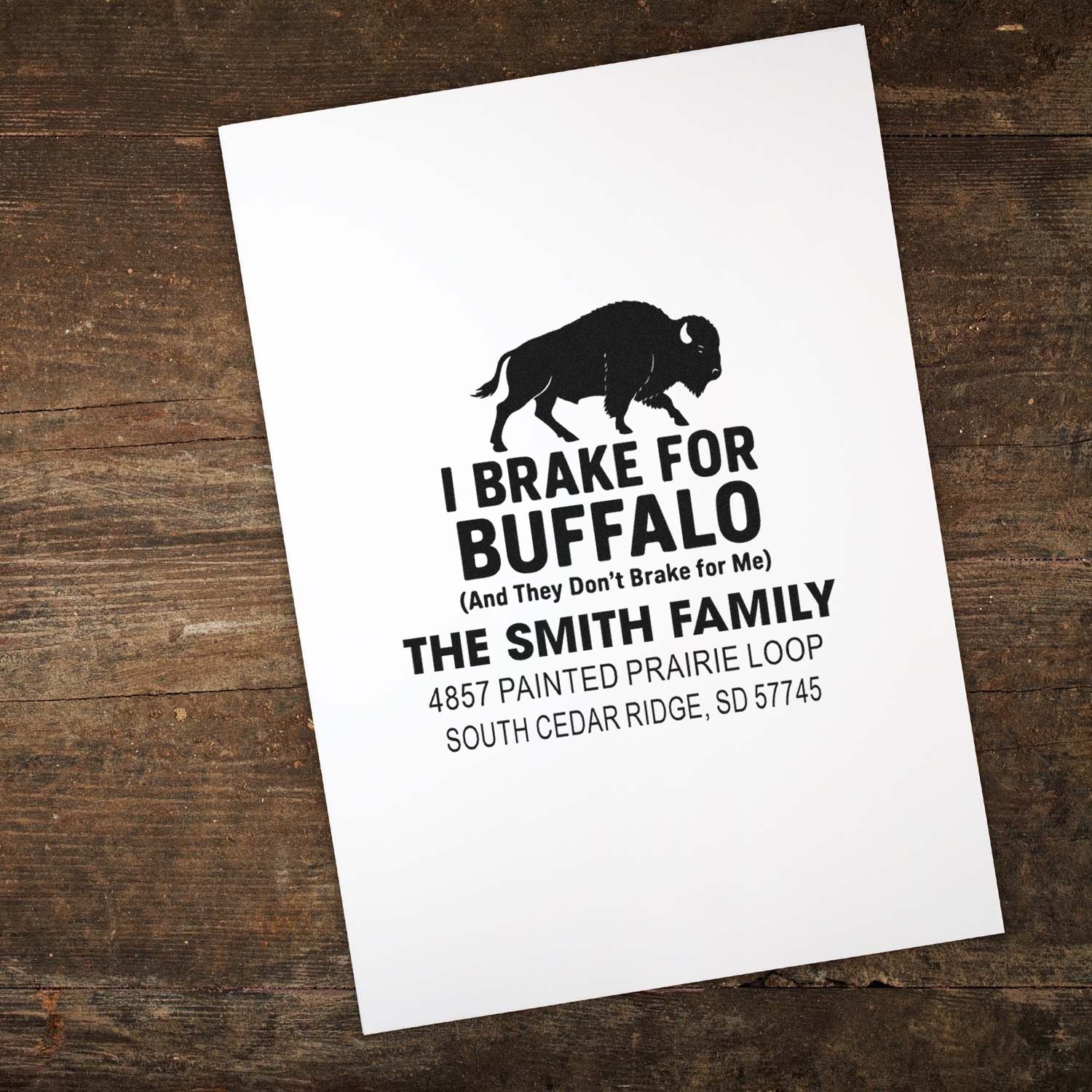 Custom rubber stamp design with buffalo graphic and return address for family mail, reading I Brake for Buffalo.