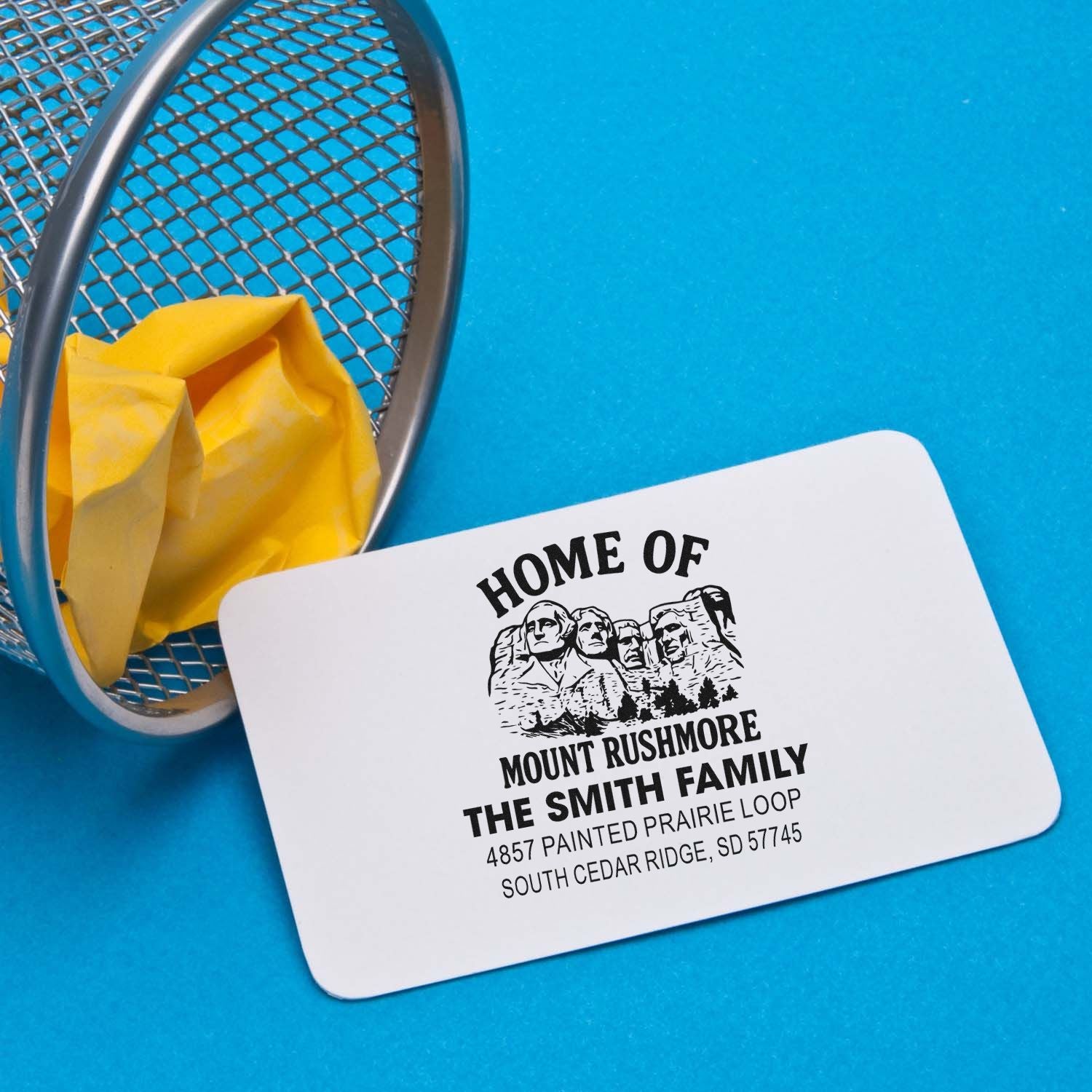 Custom Mount Rushmore return address rubber stamp for personalized envelopes, featuring family name and South Dakota mailing address.