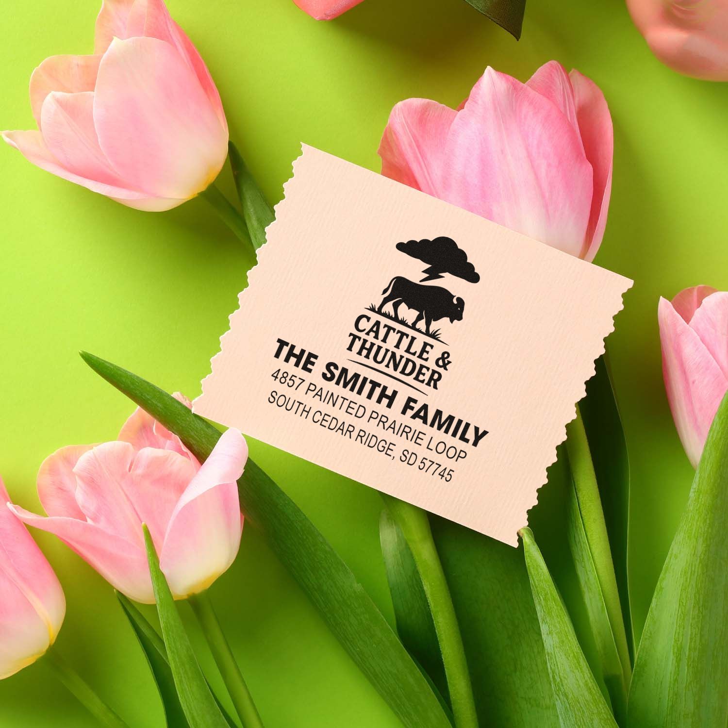 Custom return address rubber stamp with cattle logo and Smith family address on a floral background.