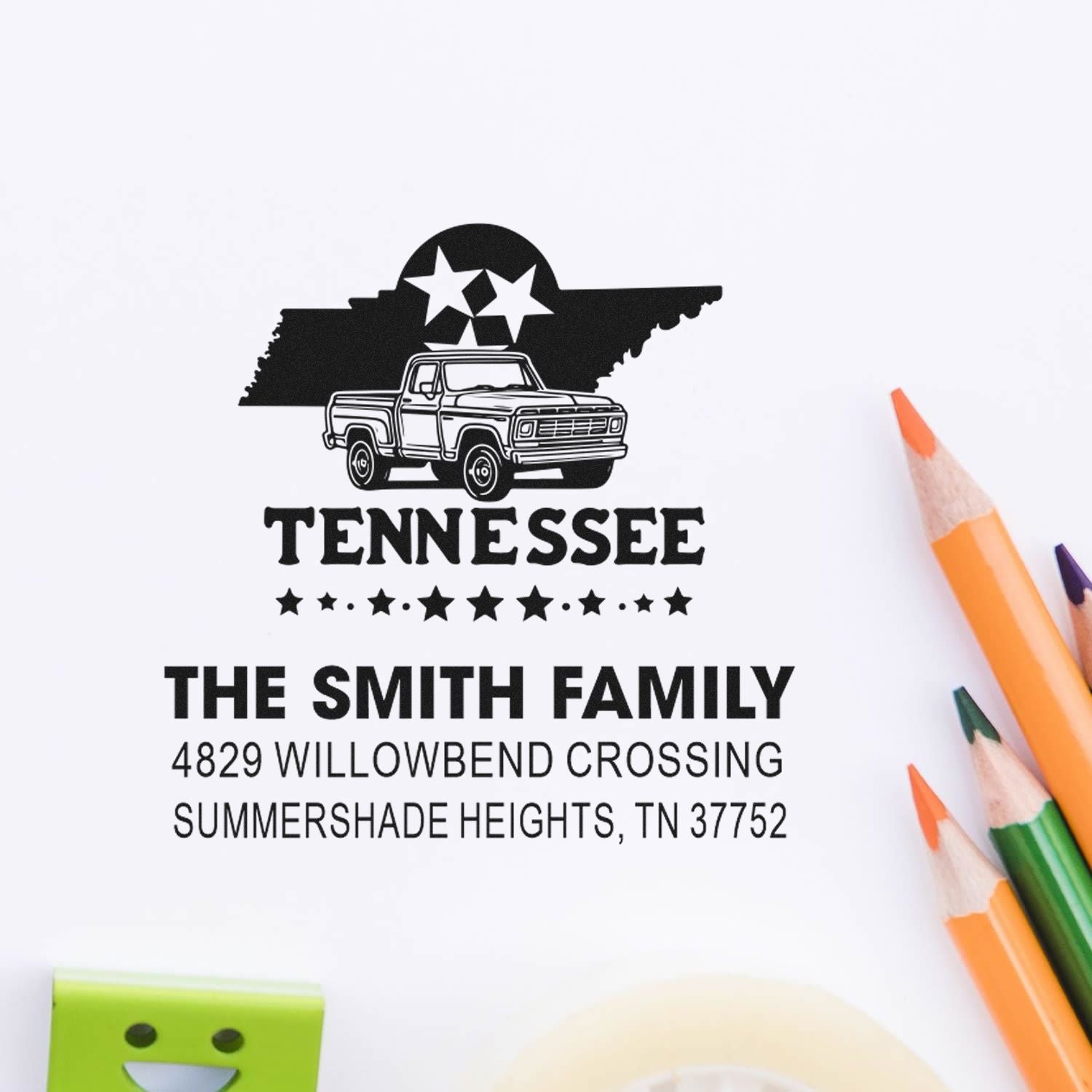 Personalized Tennessee address rubber stamp with pickup truck design, family name, and return address for mailings.