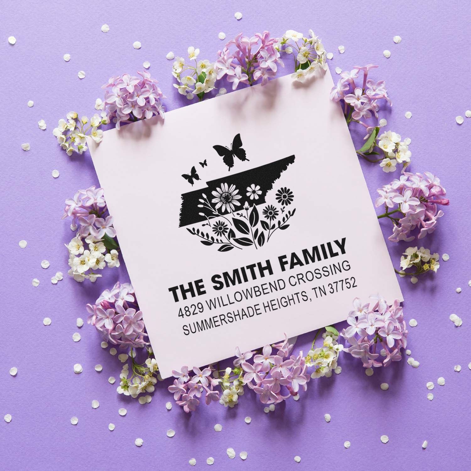 Personalized floral family address rubber stamp with butterflies and custom return address for wedding invitations and mail.