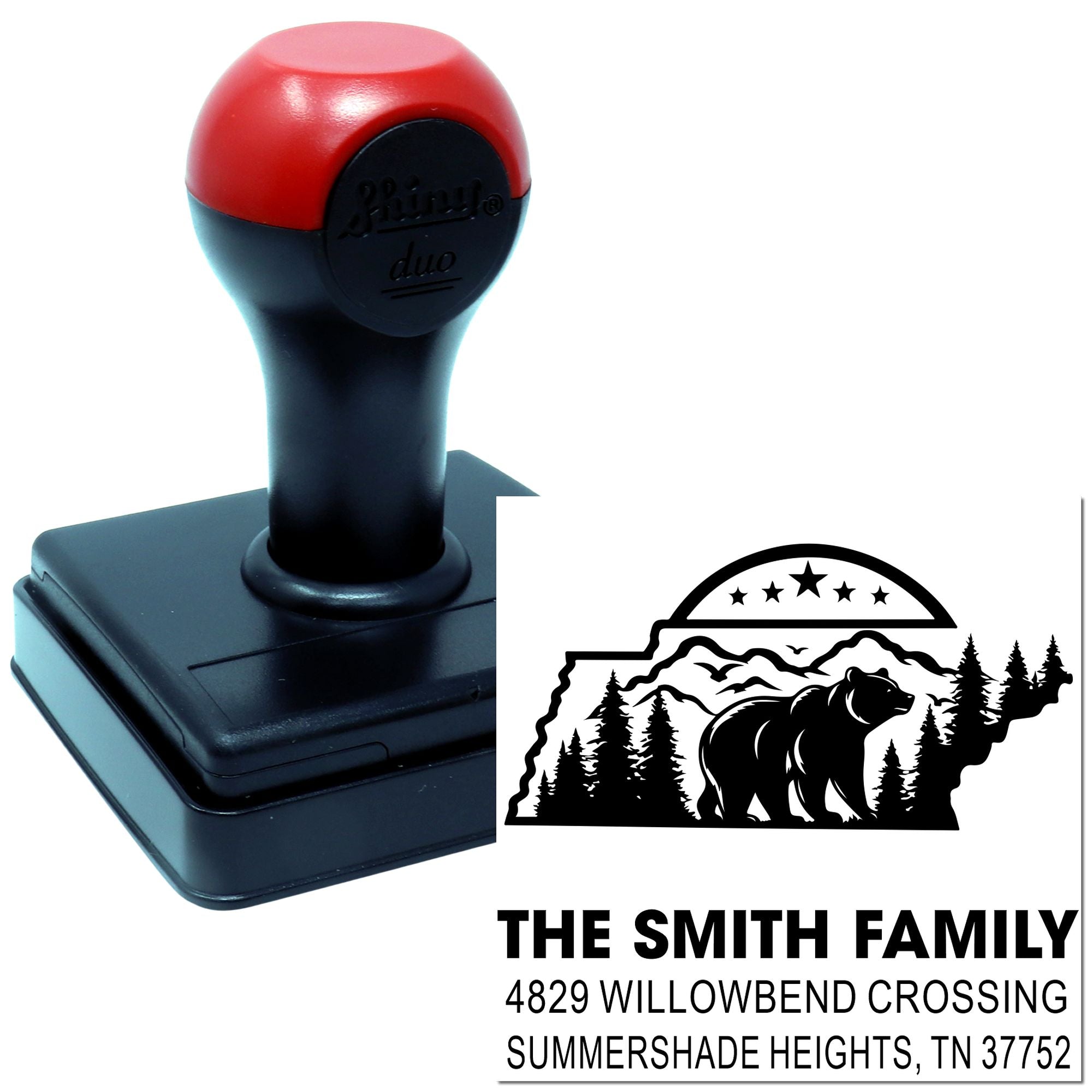 Custom self-inking rubber address stamp with bear and mountain design for The Smith Family return address.