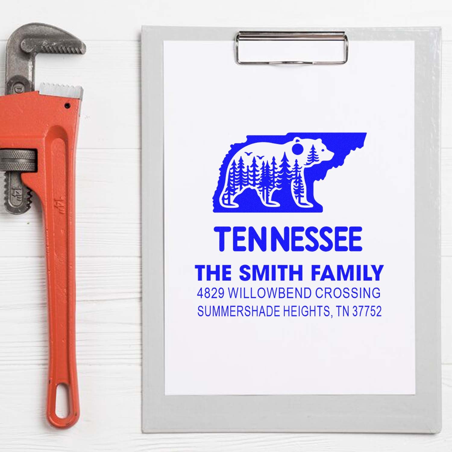 Personalized Tennessee address rubber stamp for The Smith Family with bear design and return mailing details.