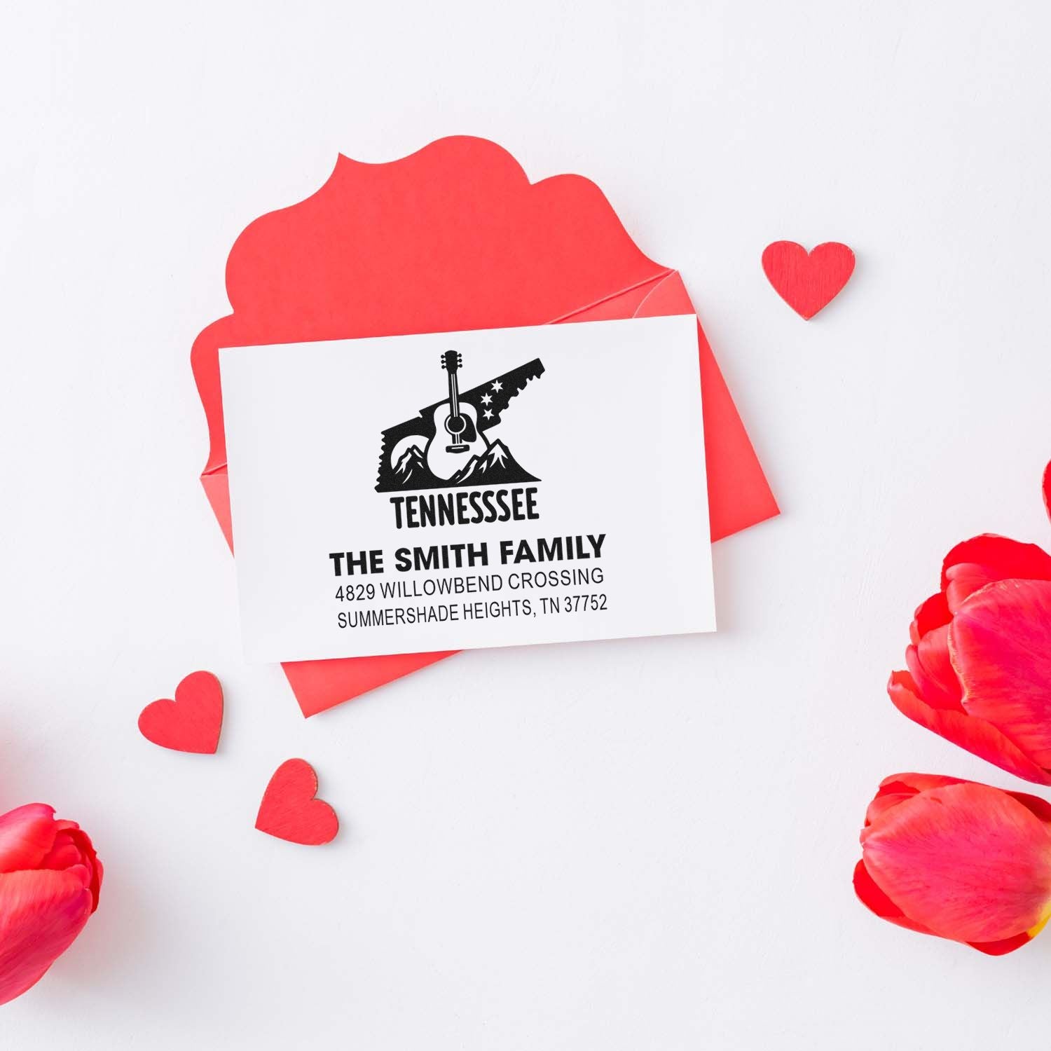 Custom Tennessee return address rubber stamp with guitar and mountain design, shown on Valentines stationery.