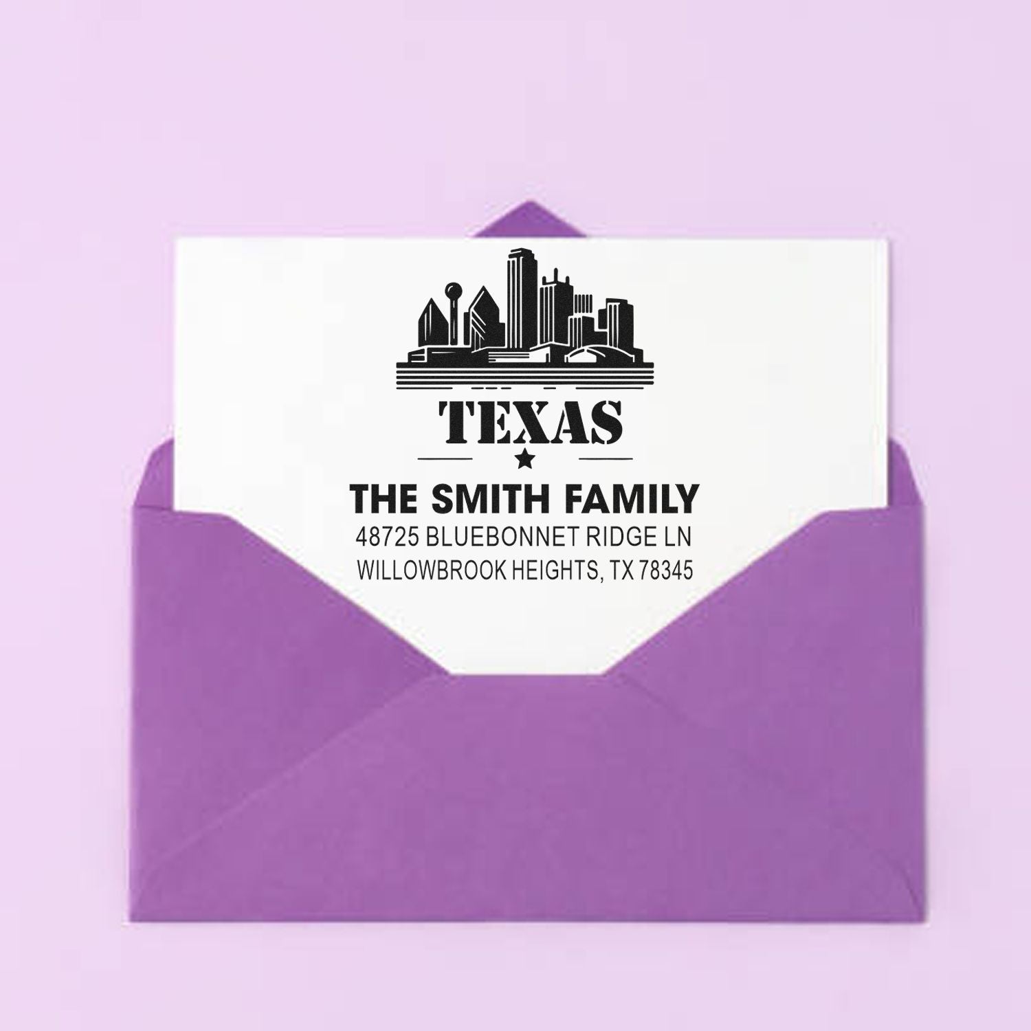 Personalized Texas skyline return address rubber stamp on a purple envelope for The Smith Family mailing labels.