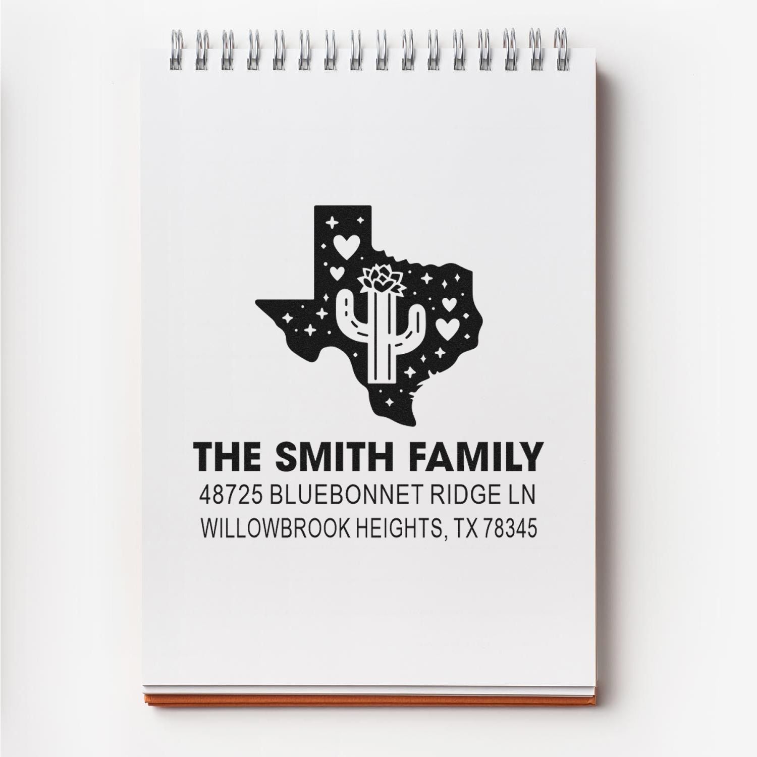 Custom Texas family return address stamp with cactus heart logo and personalized mailing address.
