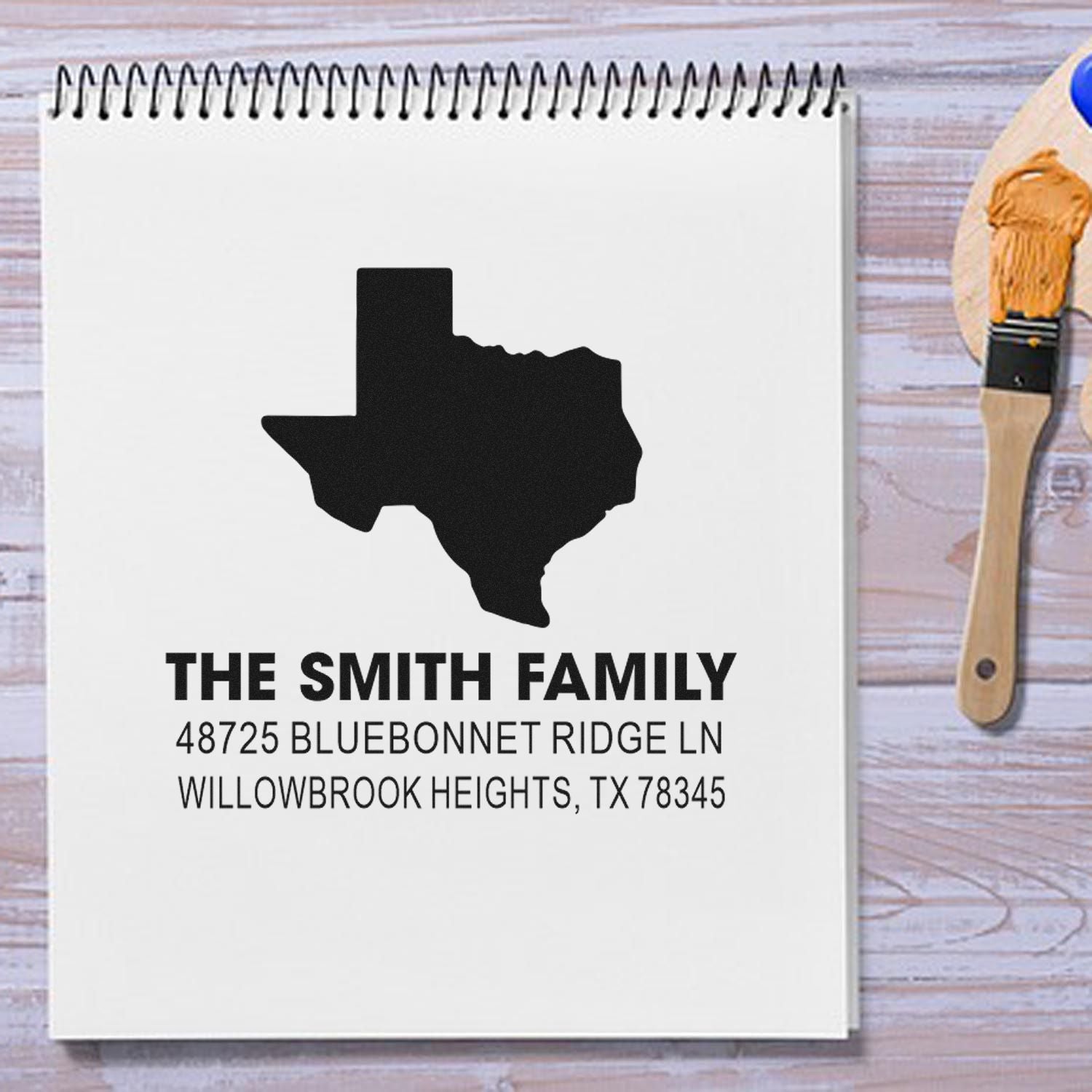 Custom Texas family address stamp with The Smith Family name and mailing address for personalized rubber stamping.