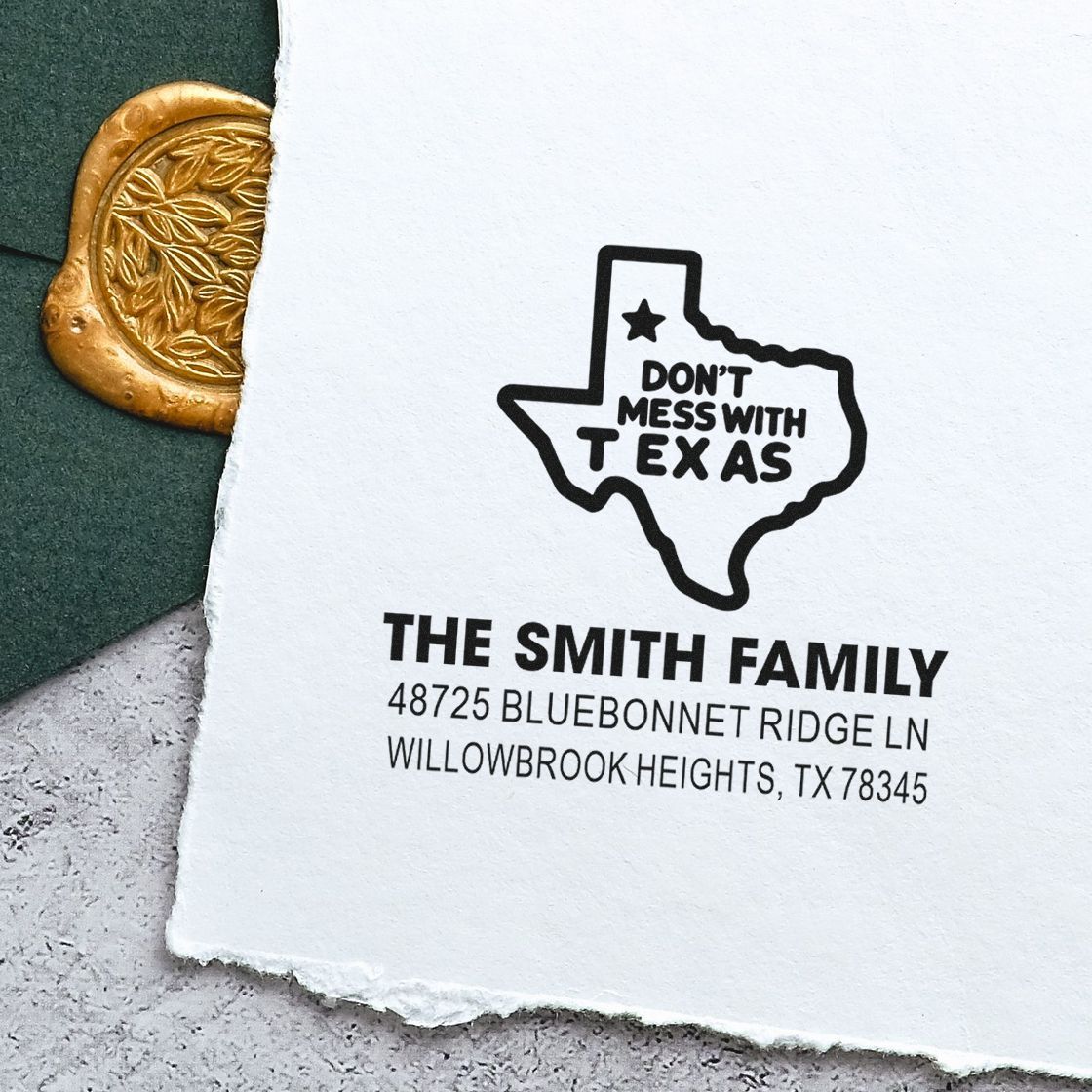 Custom Texas return address rubber stamp with family name and address, featuring a "Don't Mess with Texas" state outline.