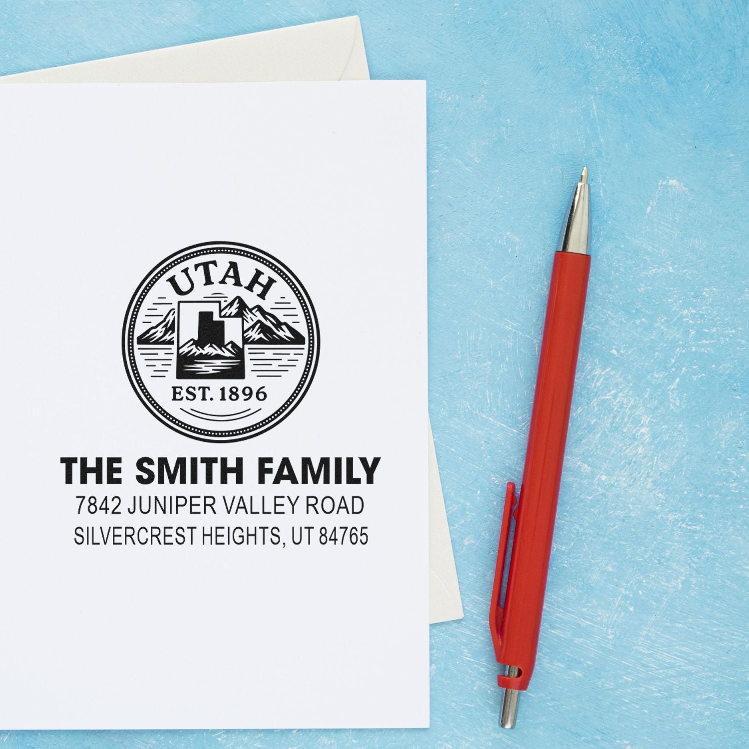 Custom address rubber stamp with Utah state seal for The Smith Family return envelopes