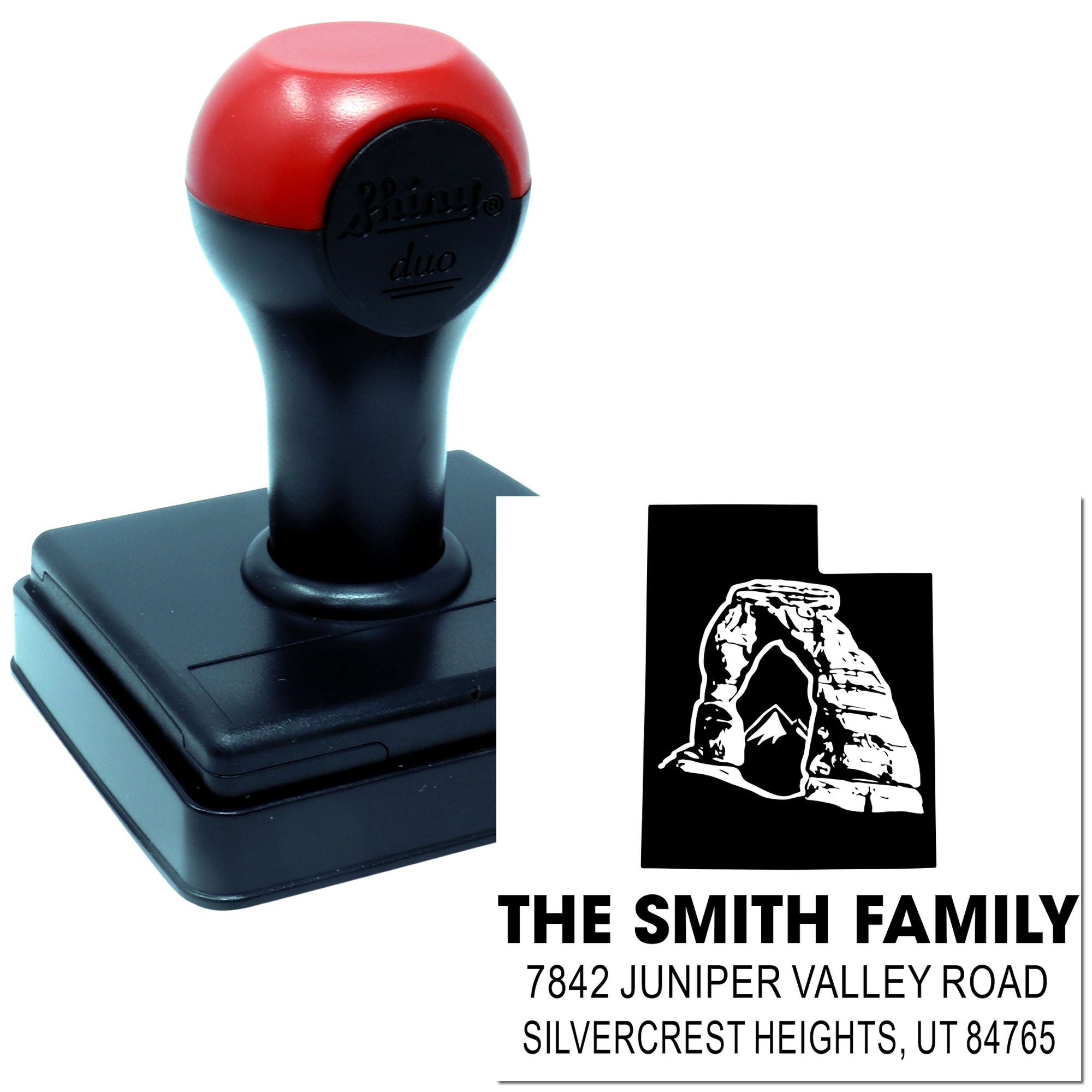 Custom self-inking rubber stamp with return address for The Smith Family, featuring a personalized logo and address imprint.