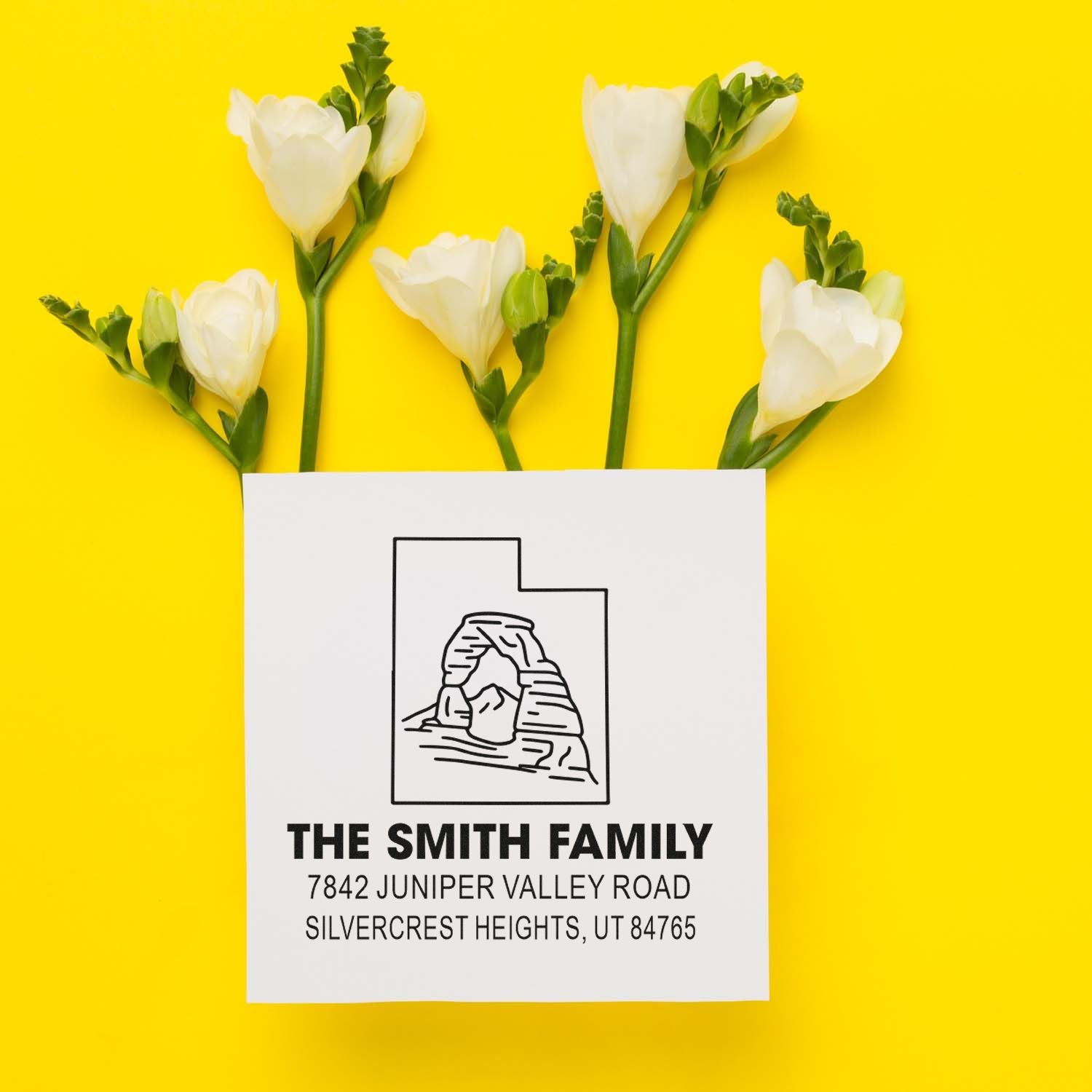 Custom return address rubber stamp for The Smith Family, featuring a home icon and mailing address for envelopes.