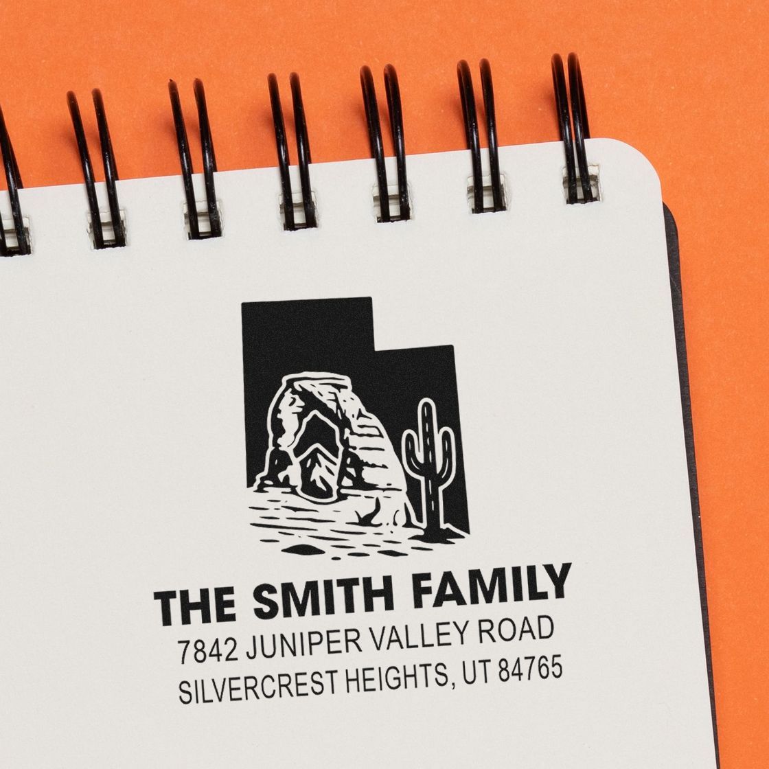 Custom family return address rubber stamp with desert canyon and cactus logo, The Smith Family, Utah.