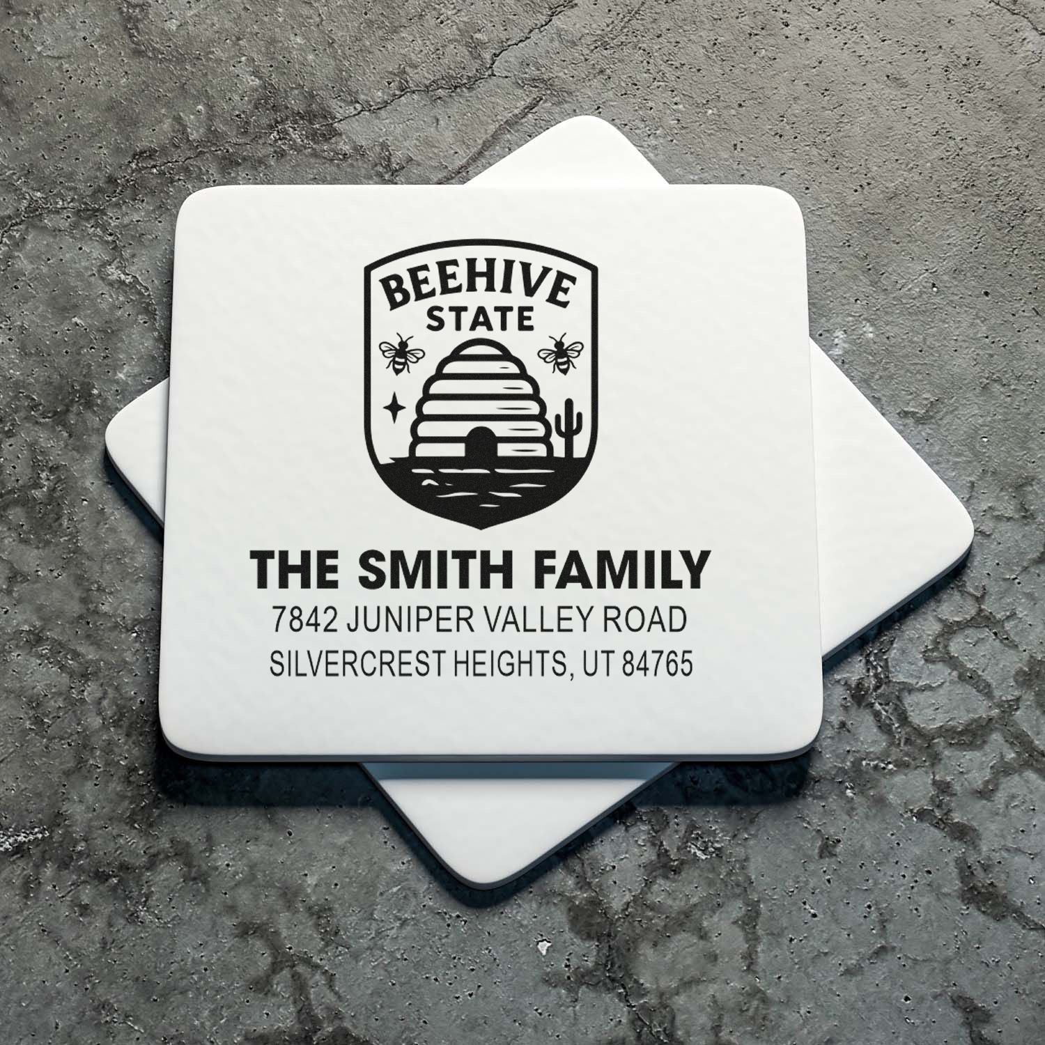Custom return address rubber stamp for The Smith Family with Beehive State logo and Silvercrest Heights, UT address.