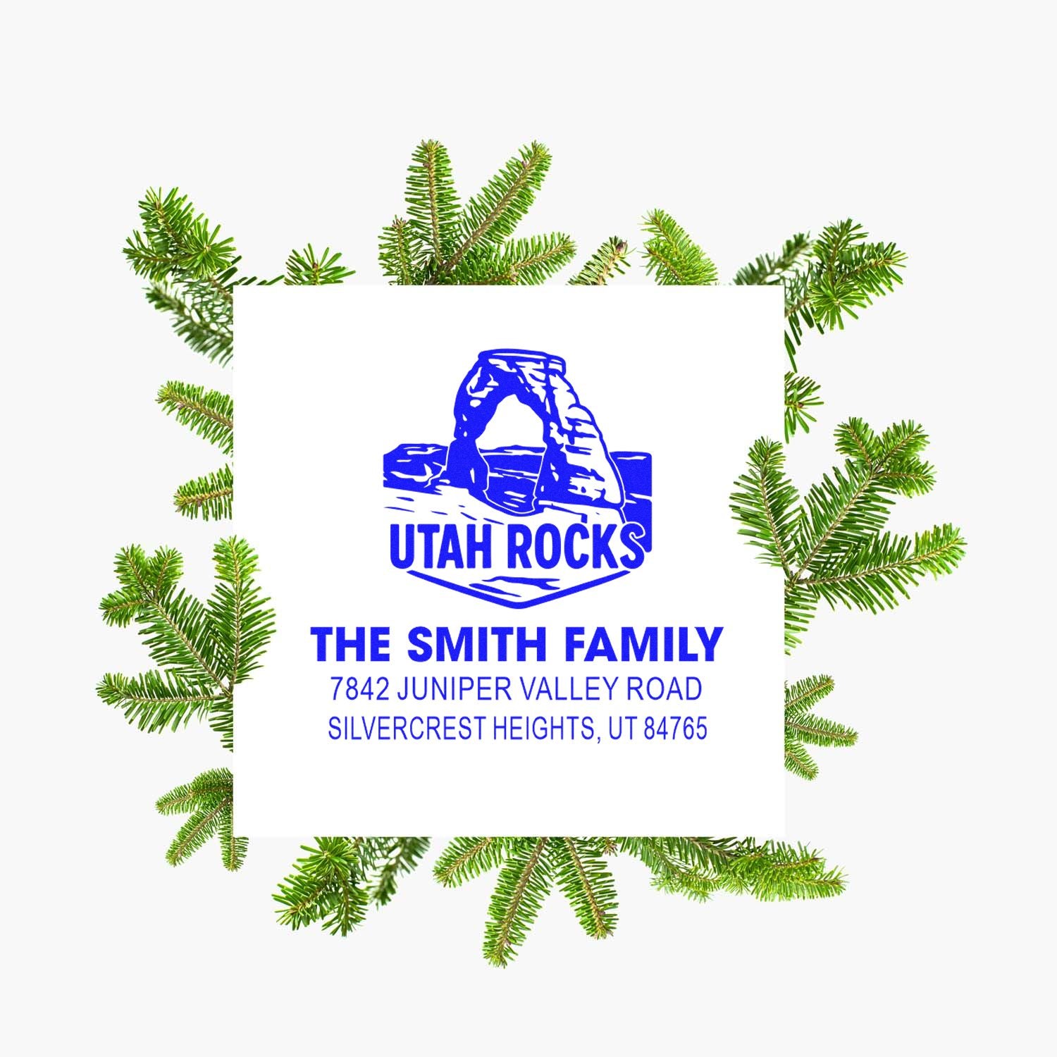 Custom Utah Rocks return address rubber stamp for The Smith Family, with full address and evergreen tree accents.