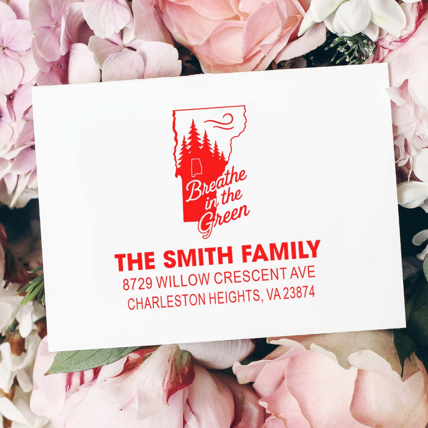 Custom return address rubber stamp with tree-state design and personalized Smith Family address imprint.