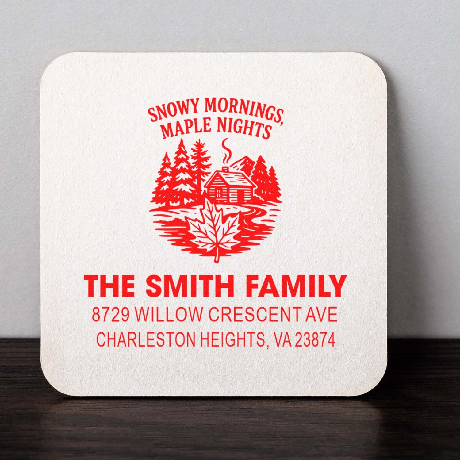 Personalized return address rubber stamp for The Smith Family with winter cabin and maple leaf design.