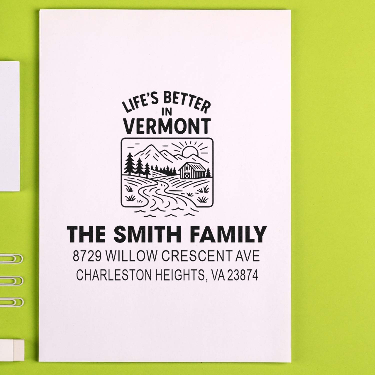 Custom return address stamp with Lifes Better in Vermont mountain scene for The Smith Family, displayed on a white card over a lime green background.