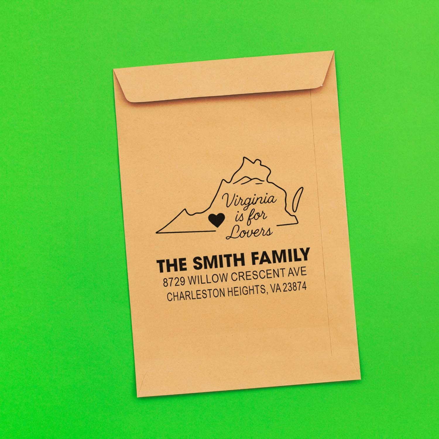 Custom Virginia return address stamp on kraft envelope, featuring Virginia is for Lovers and The Smith Family address on bright green background.