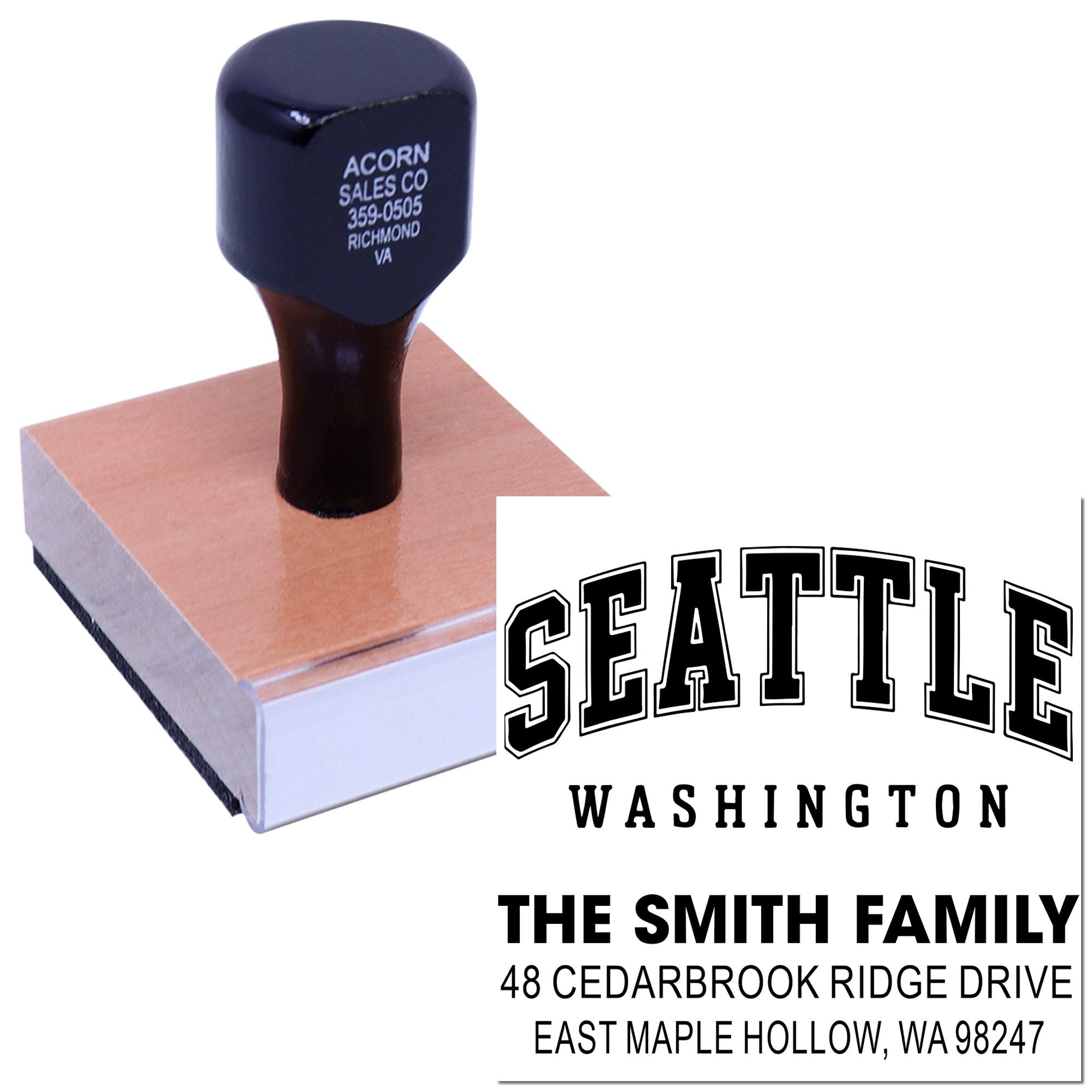 Self-inking custom address stamp with Seattle, Washington imprint and The Smith Family mailing address on a white background.