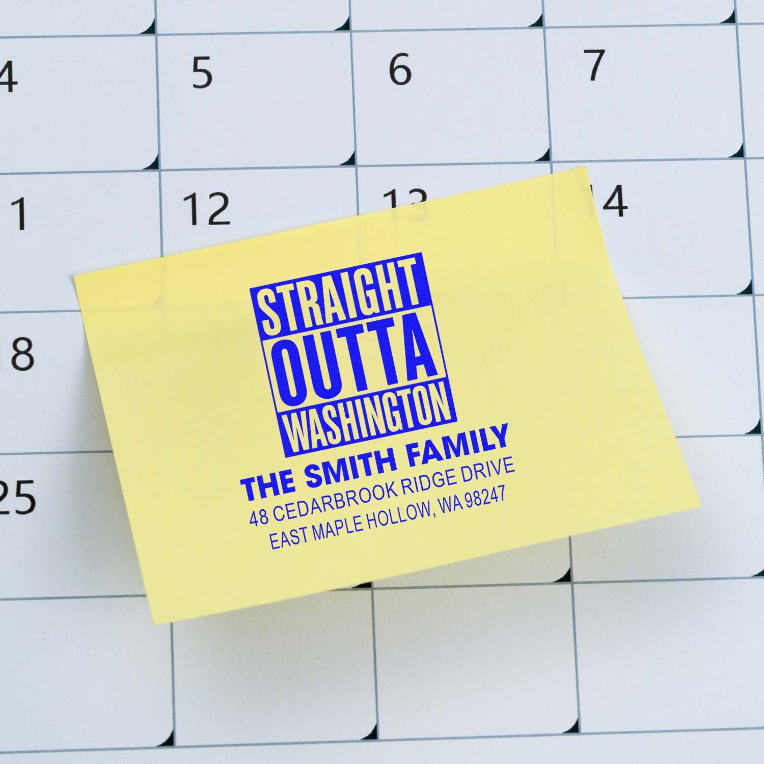 Custom address stamp reading Straight Outta Washington for the Smith family, displayed on a calendar background.